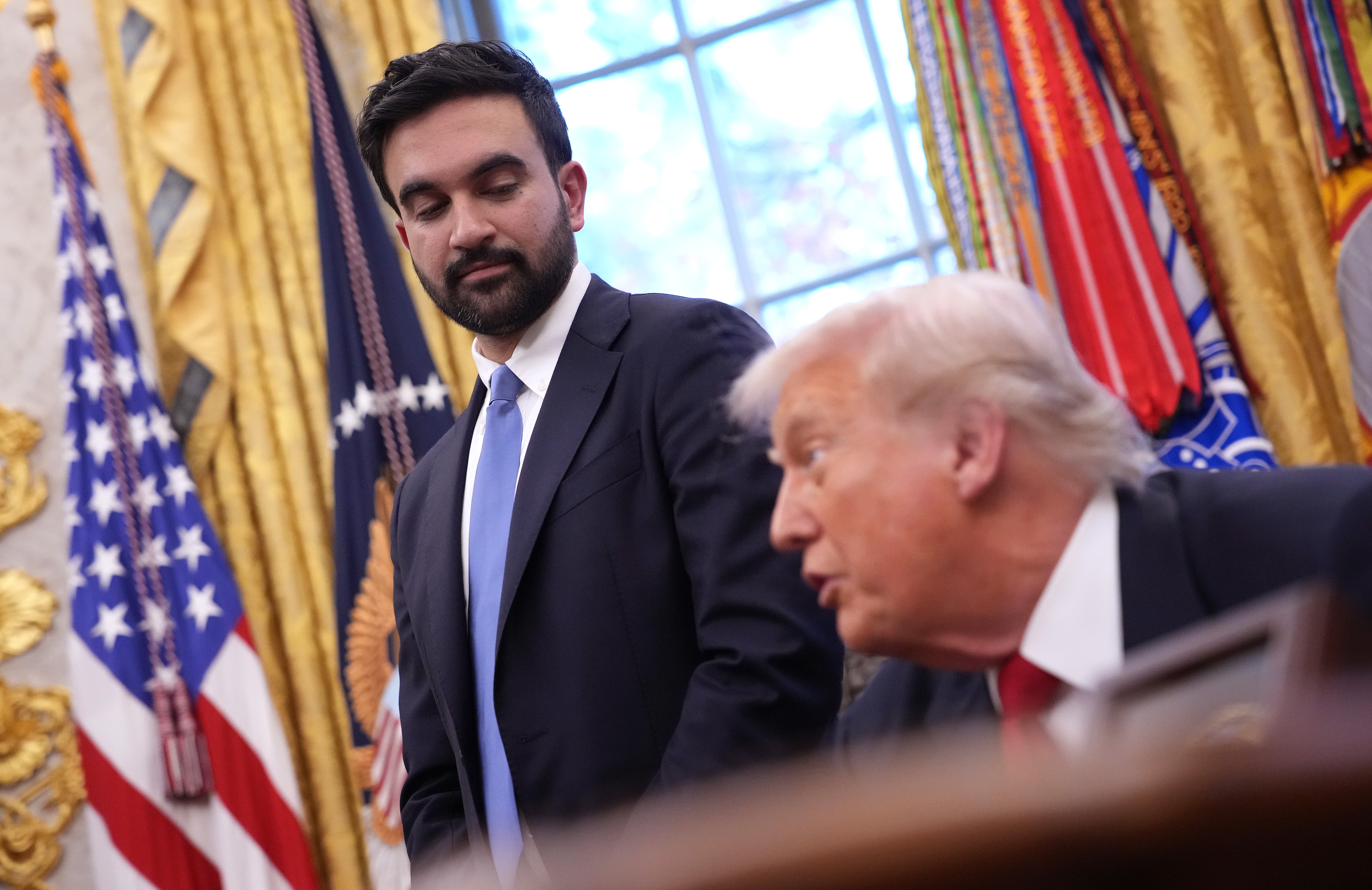 It remains unclear whether New York City Mayor Zohran Mamdani and President Donald Trump, seen here during a November 2025 meeting in the Oval Office, will speak at tonight's Knicks-Spurs game (Getty Images)