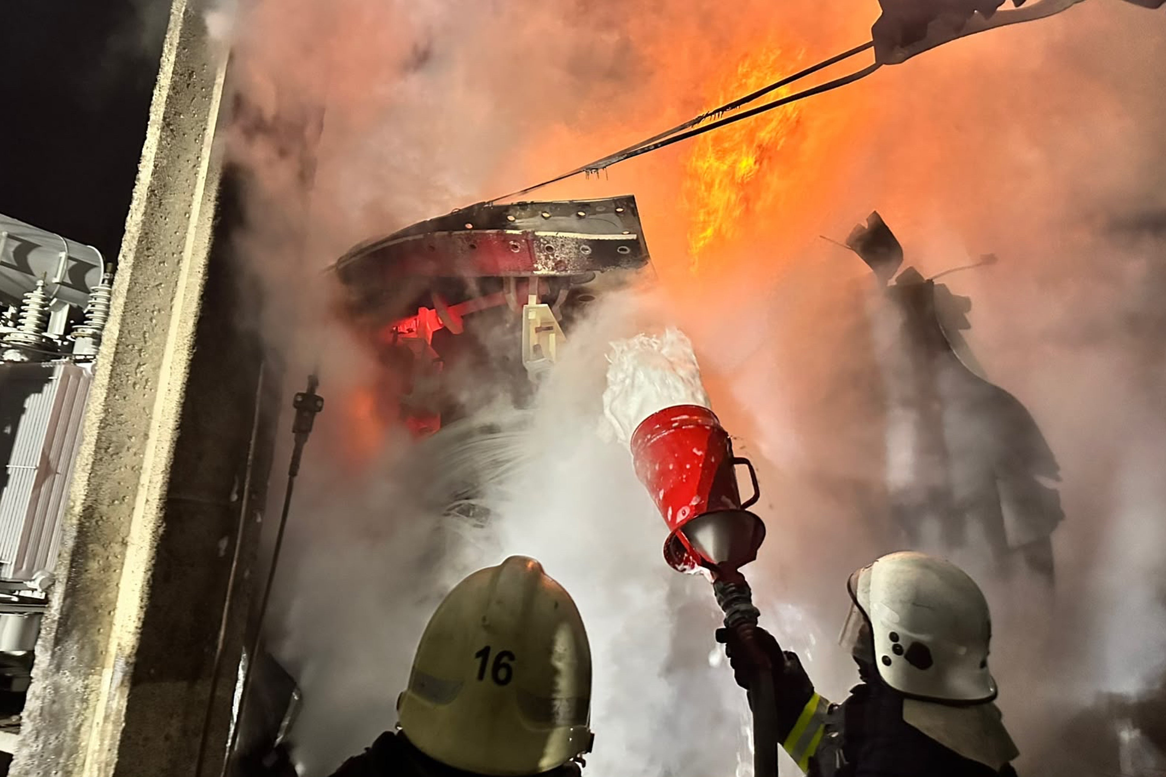 File: In this photo, provided by the Ukrainian Emergency Services on Monday, 8 June 2026, rescue workers extinguish a fire of an energy facility after a Russian strike in Odesa, Ukraine