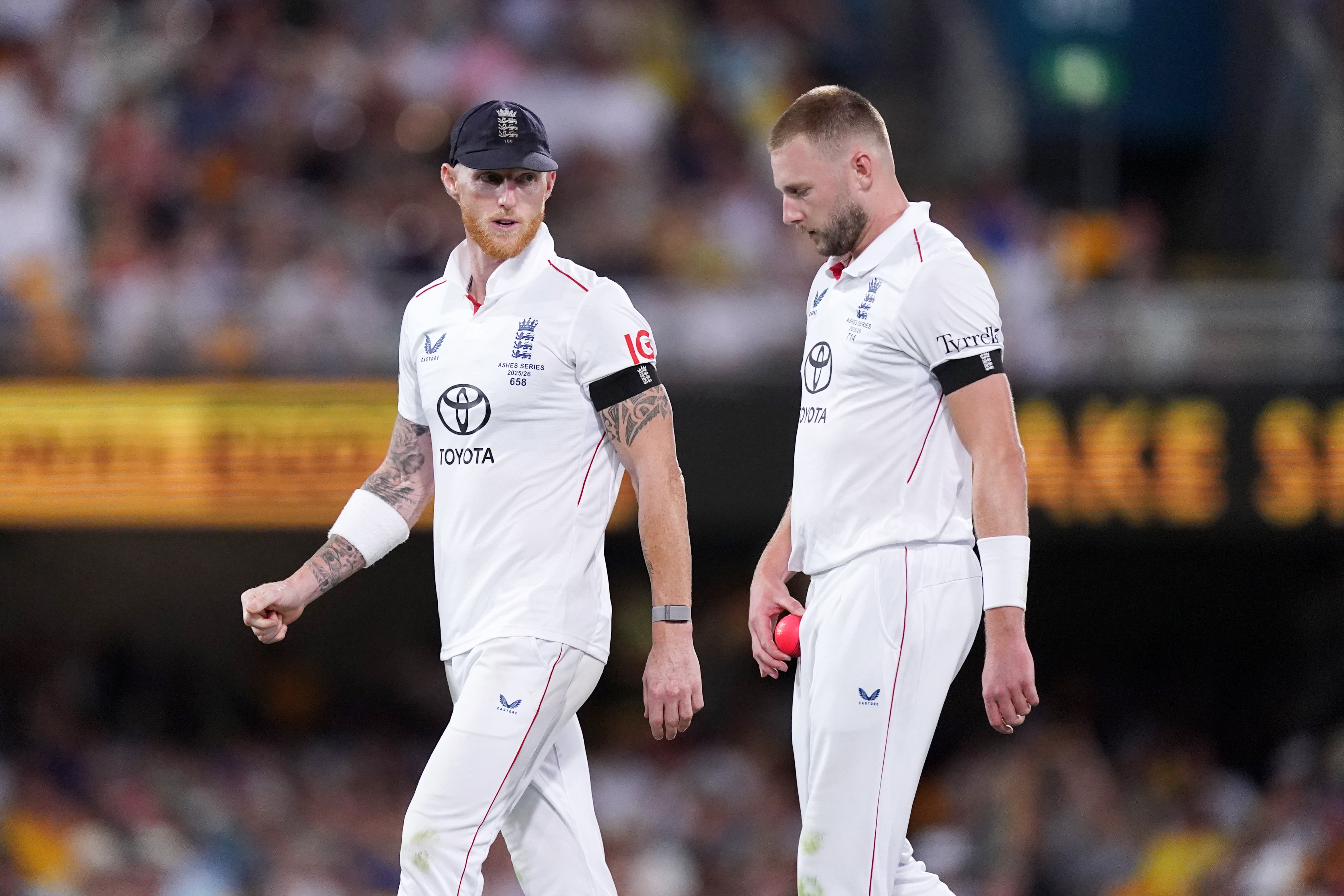 Ben Stokes, left, with fast bowler Gus Atkinson (PA)