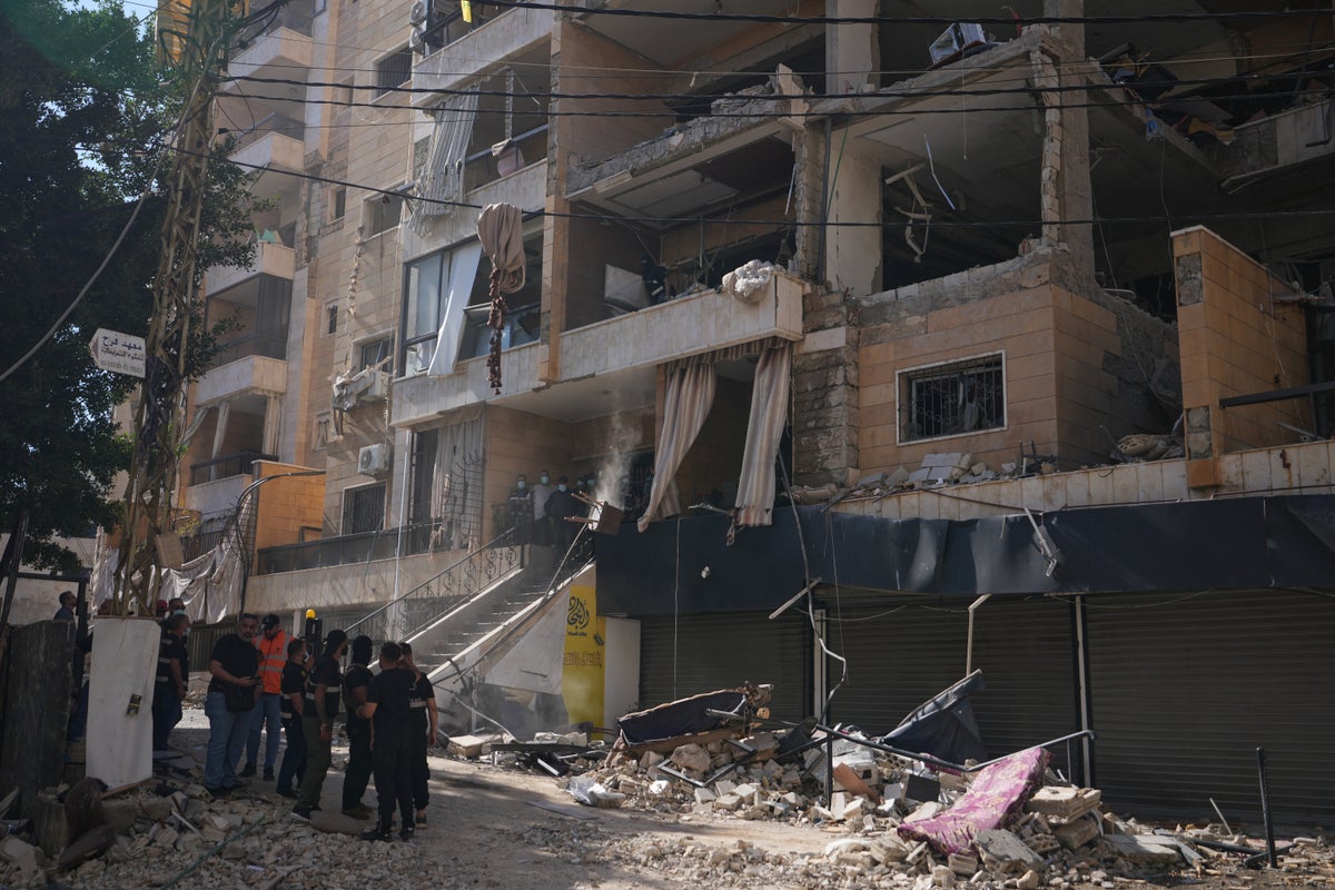 Israel and Iran exchange strikes after Beirut attack, in pho
