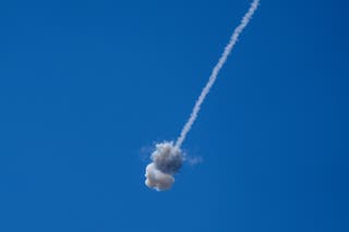An interception by Israel's Iron Dome anti-missile system, as seen from the Israeli side of the Israel-Lebanon border, June 8