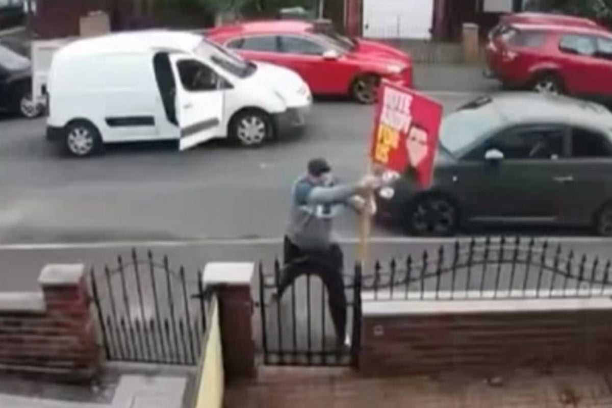 Andy Burnham shares footage of man tearing down campaign pos