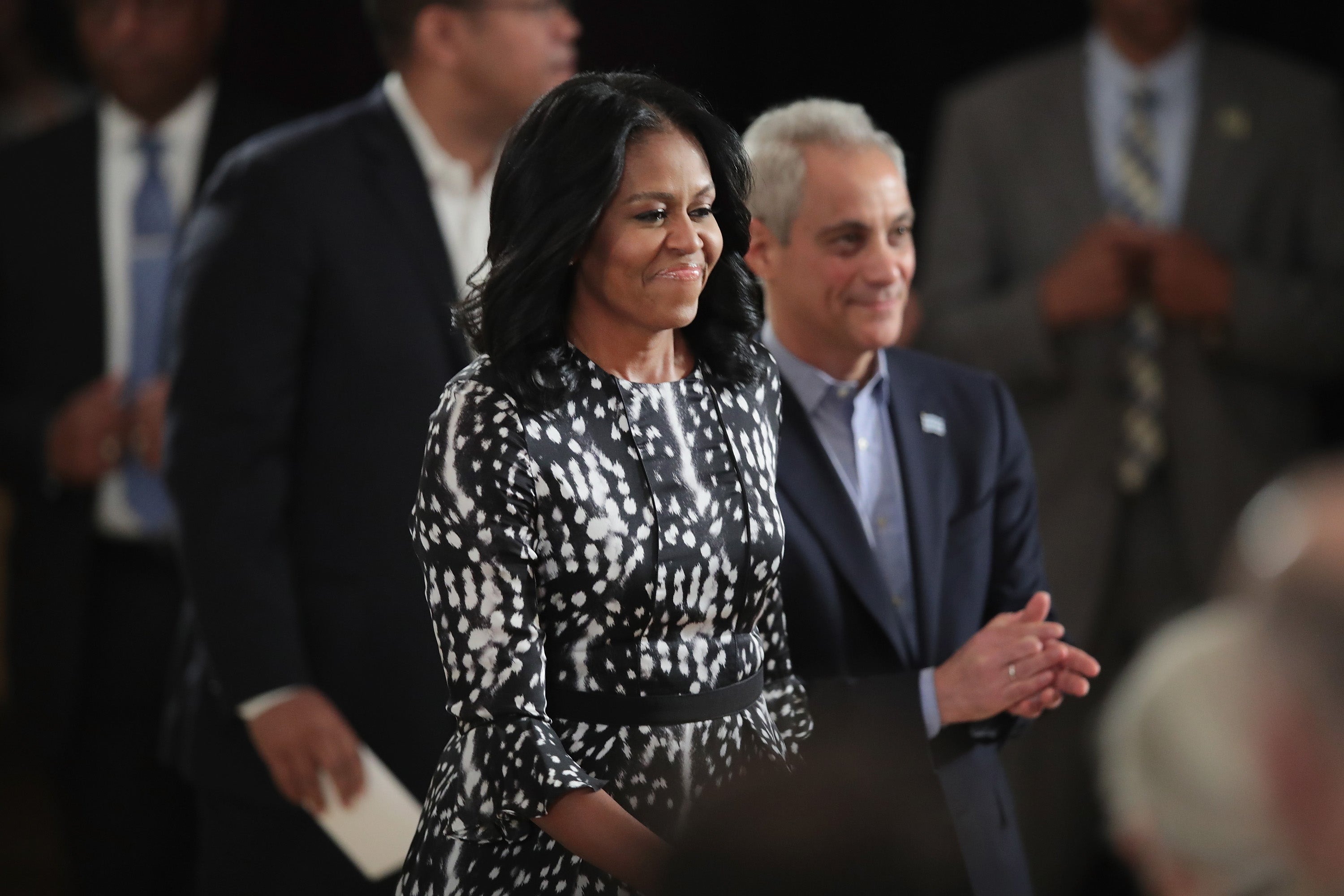 Former first lady Michelle Obama and Chicago Mayor Rahm Emanuel arrive for a roundtable discussion at the South Shore Cultural Center about the Obama Presidential Center