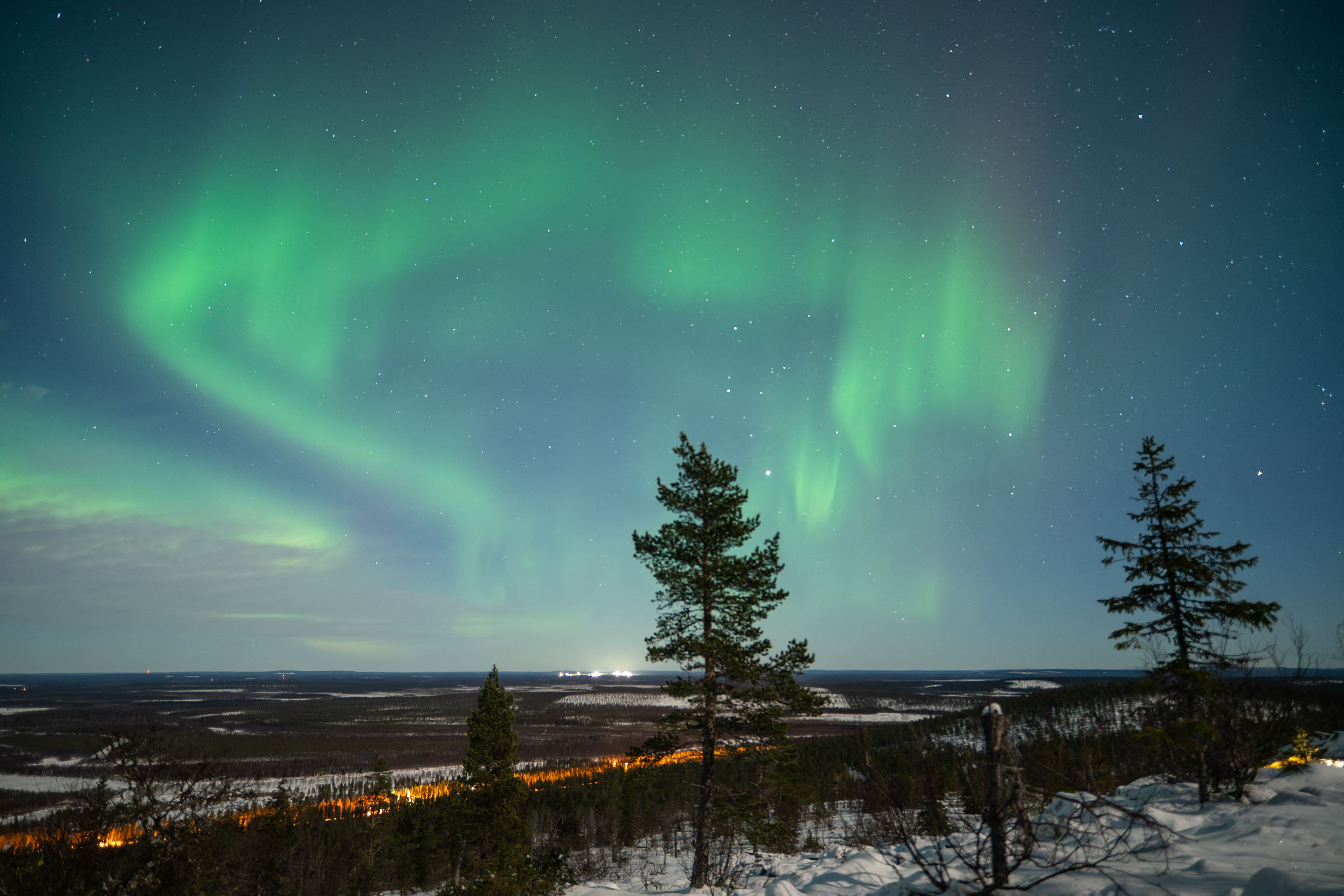 Northern lights illuminating the night sky over the Levi region in Lapland