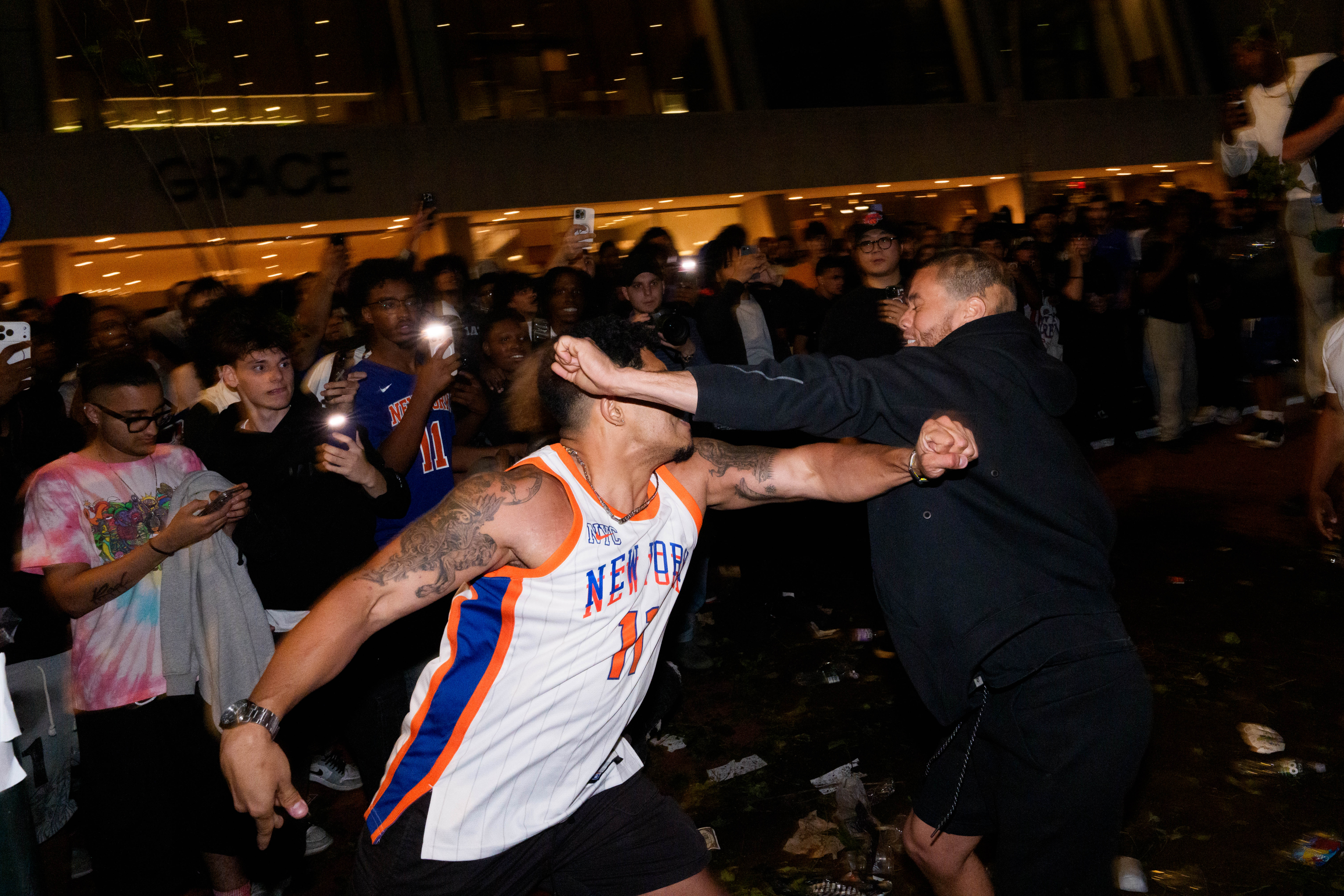 Fans were fighting in the streets as the chaos spilled out from the park (Getty)