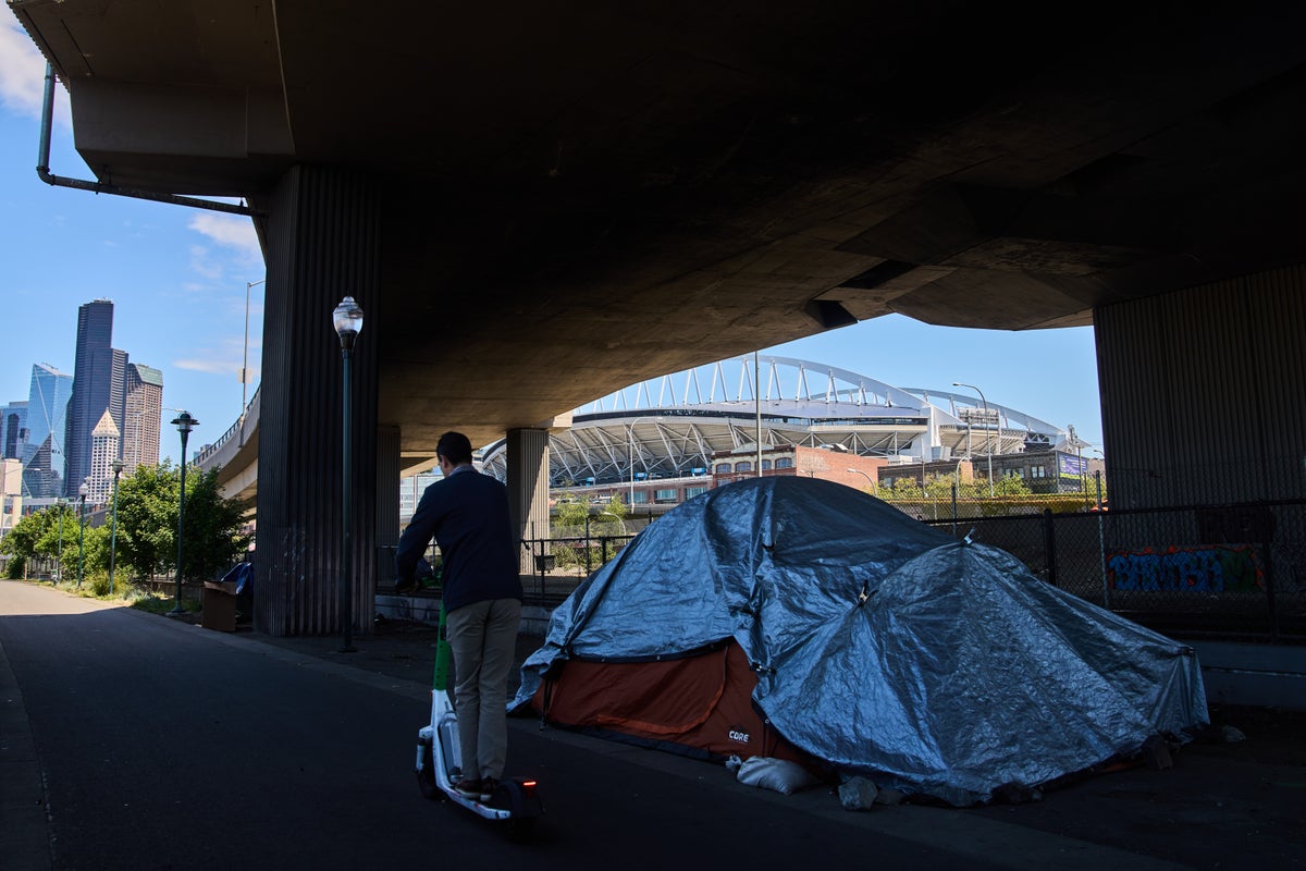 Some host cities are aiming to house, not arrest, homeless p