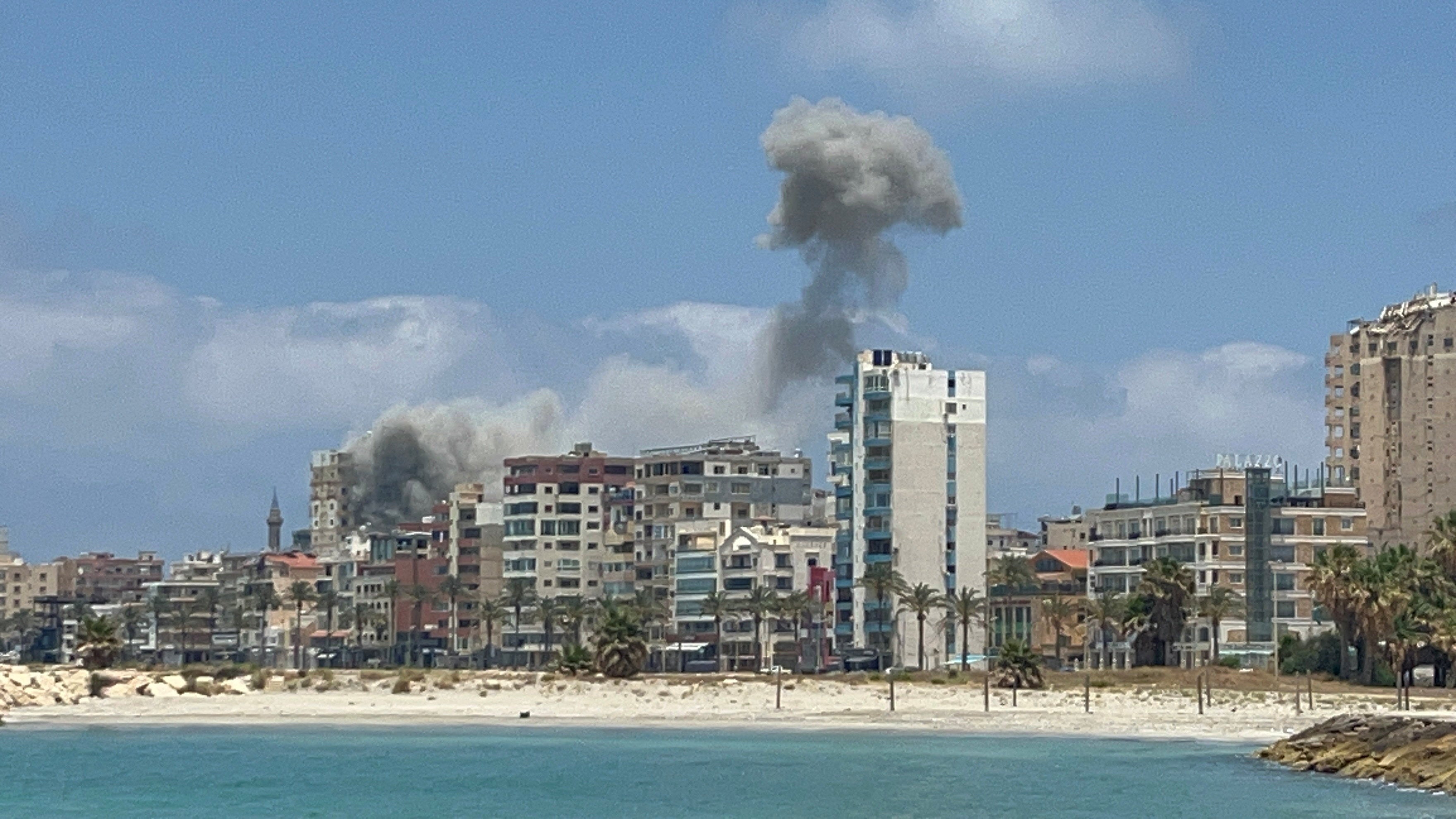 Smoke billows following an Israeli strike in Tyre, Lebanon, June 9 (Reuters)