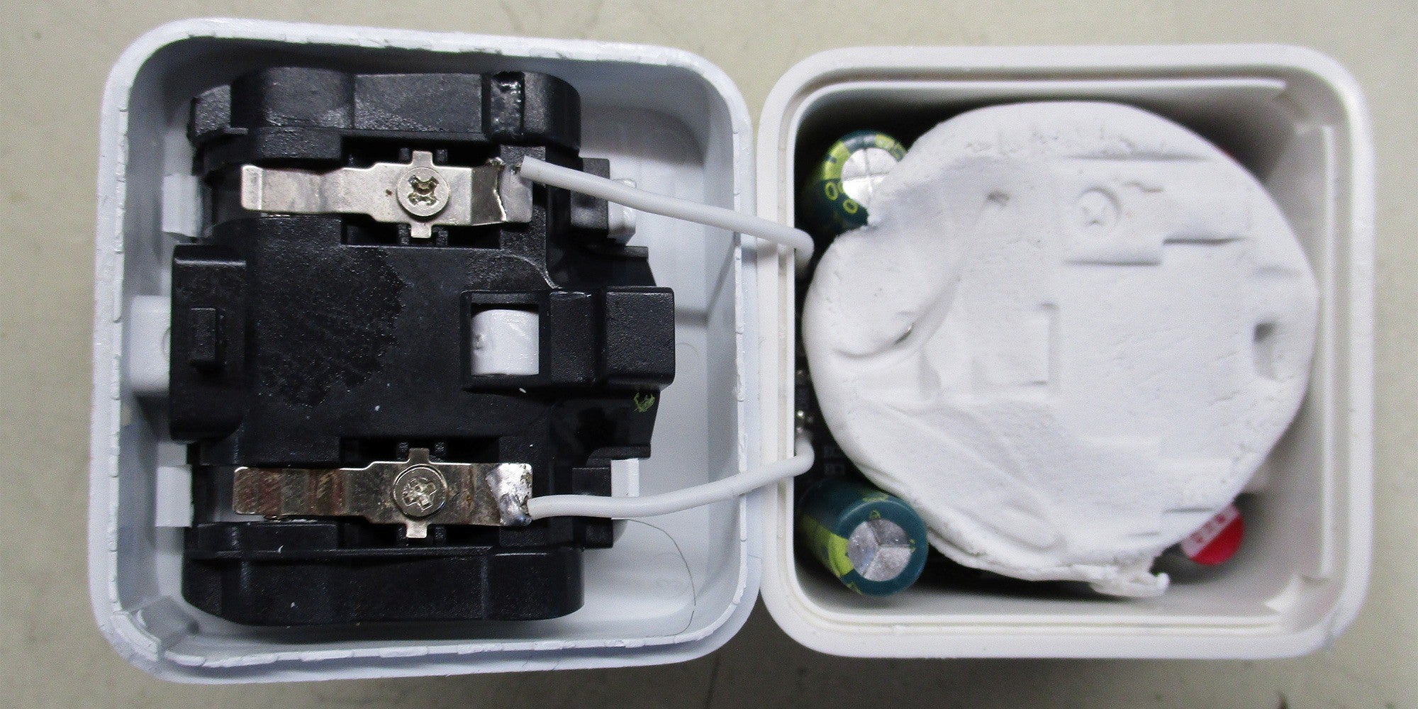One charger had a lump of modelling clay inside it, which researchers believe was used to give the charger a more weighty, robust and genuine feel (Which)