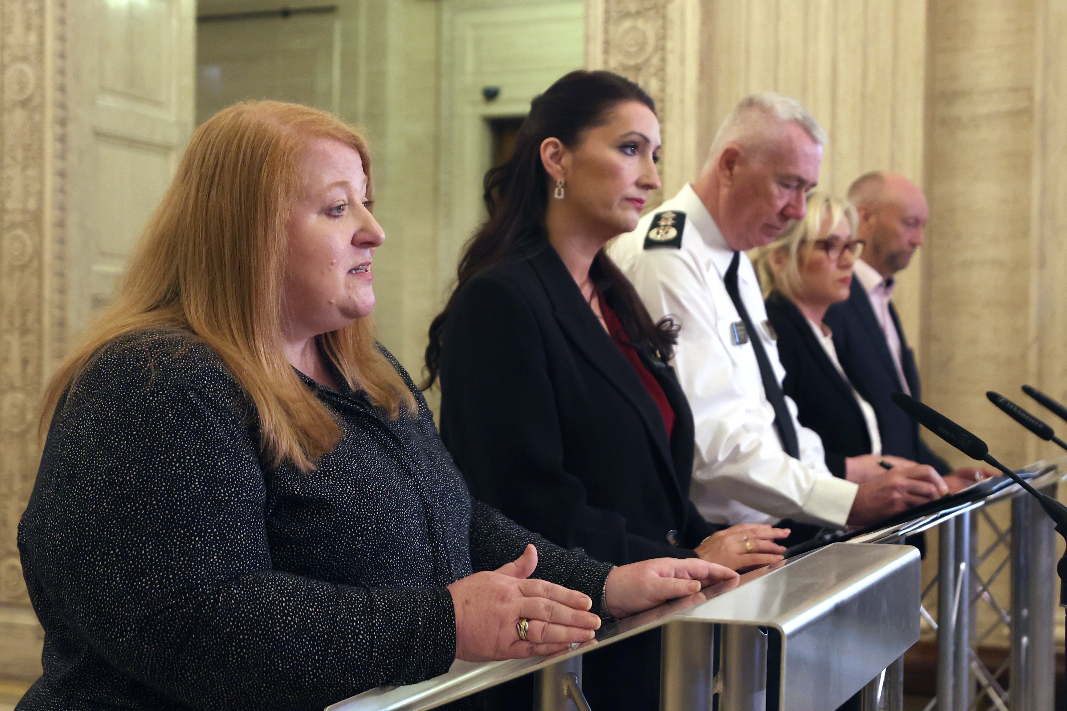 Justice Minister Naomi Long (L) pictured earlier today