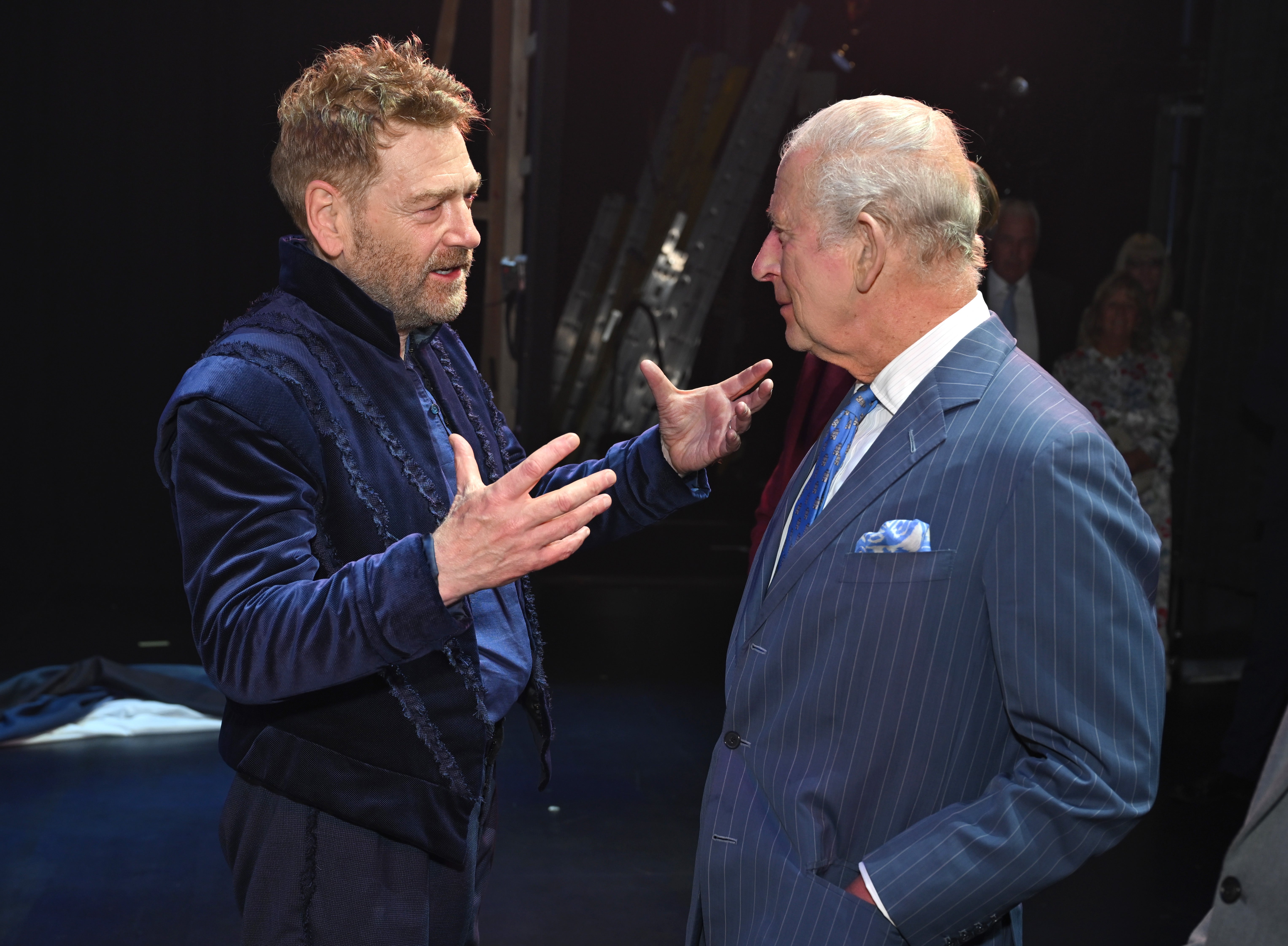 Sir Kenneth Branagh speaking to King Charles following a performance of 'The Tempest'