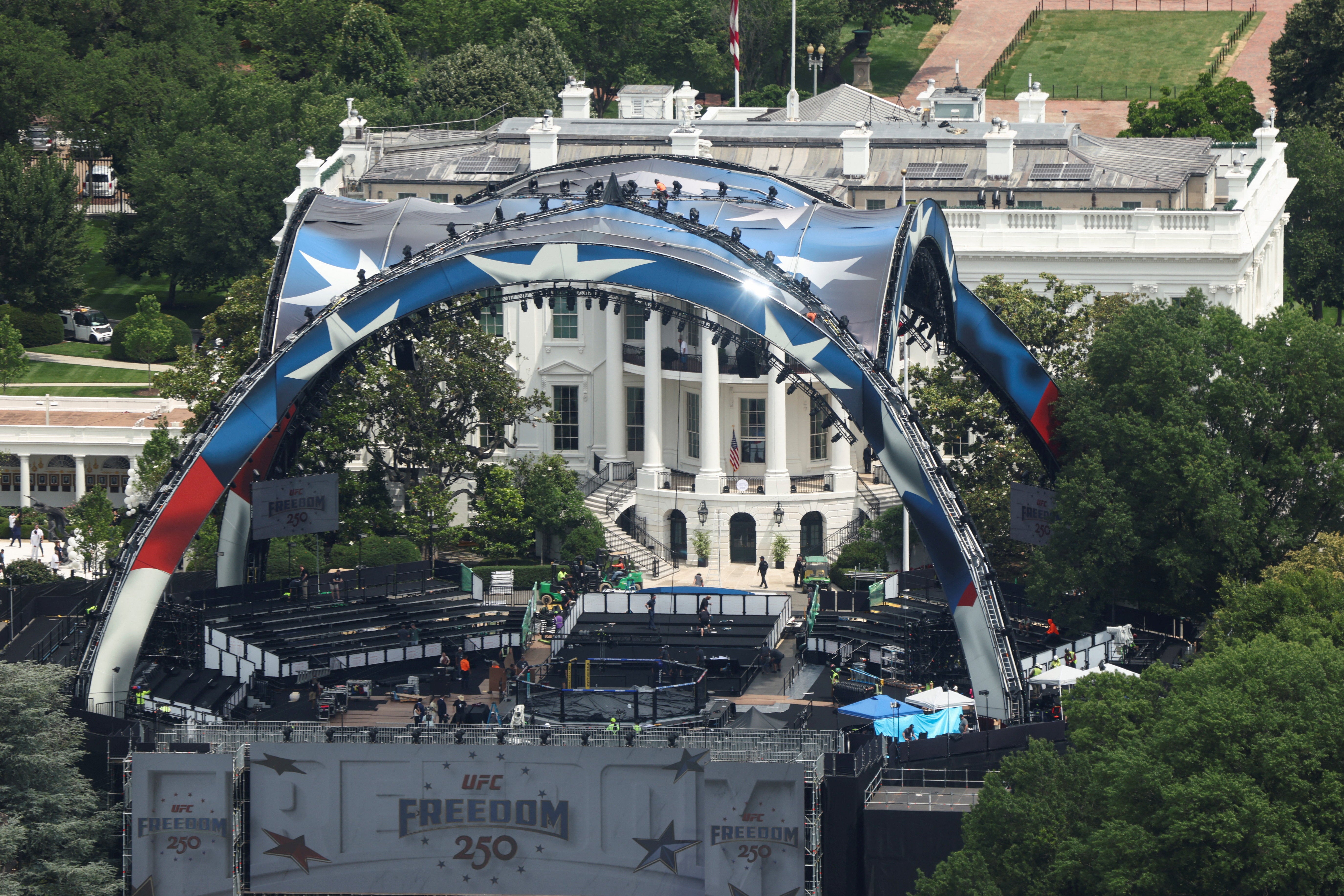 Construction continues on a temporary arena that will host the UFC Freedom 250 fight card at the White House