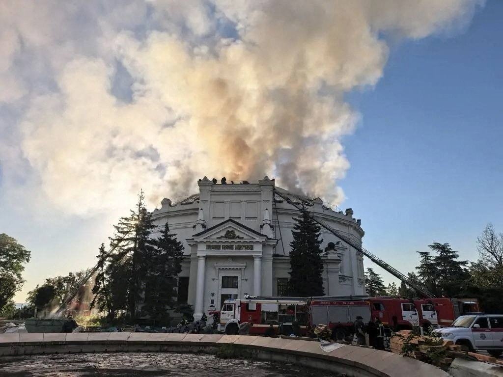 Firefighters extinguish a fire at the ‘Panorama of the Defence of Sevastopol’ museum, which, according to local authorities, was damaged in a Ukrainian drone attack in Sevastopol (Reuters)
