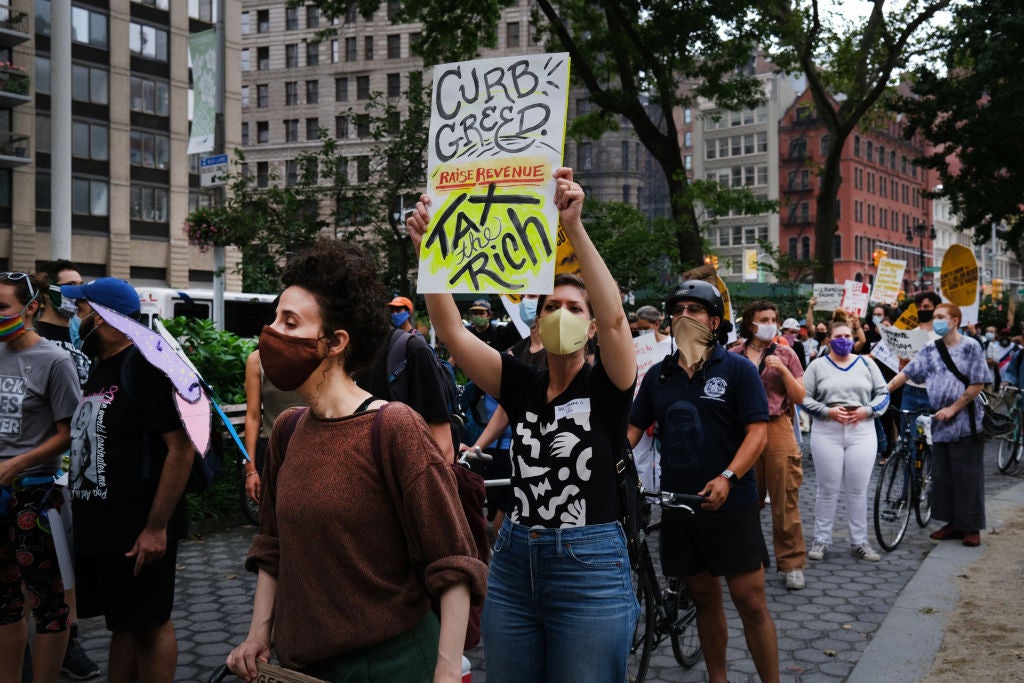 A ‘march on billionaires’ protest in May 2020 in New York City. That chasm between the ultra-rich and workers is widening. Nearly a third of America’s wealth is held by 1 percent of the population, according to Inequality.org