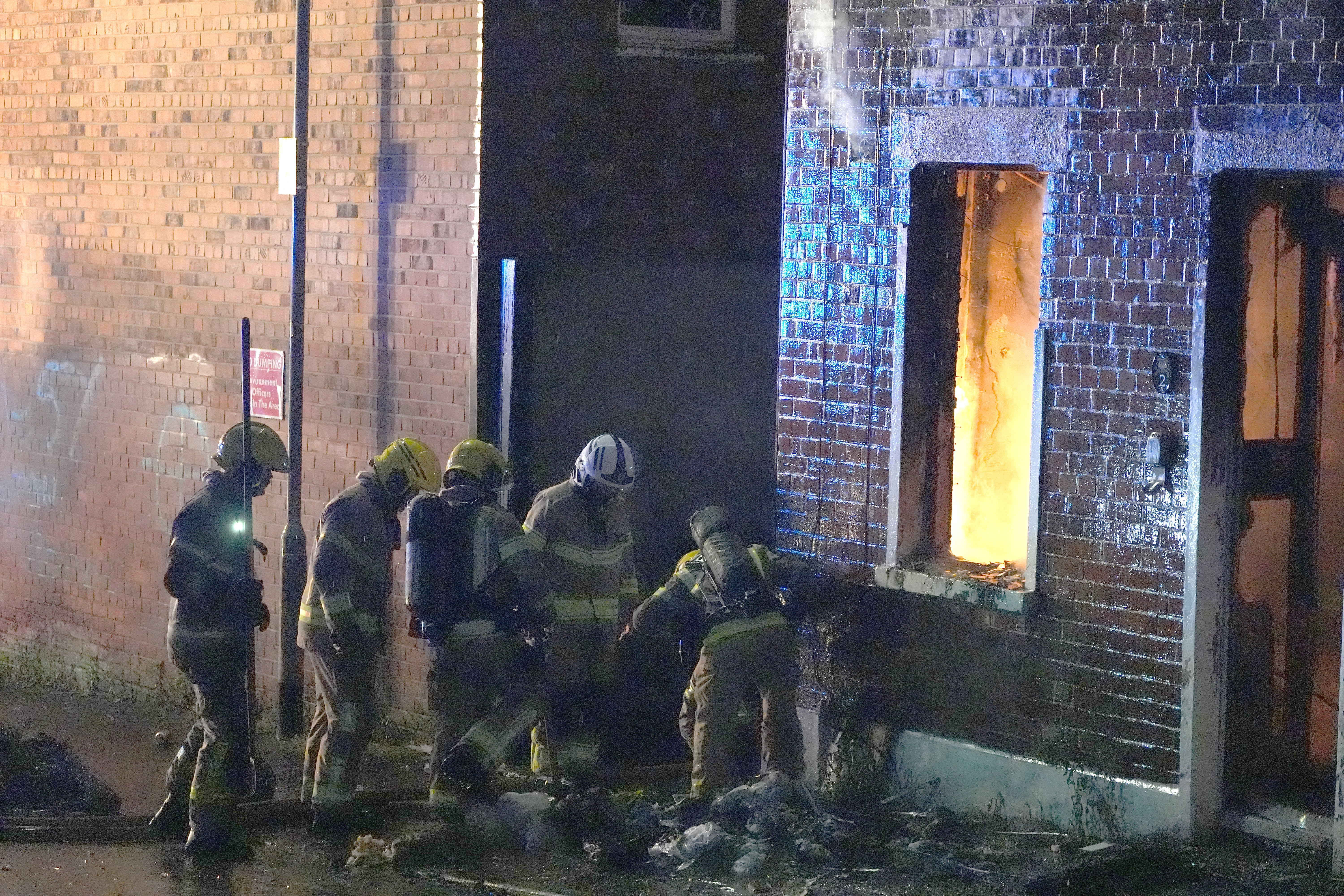 Firefighters attending a house which was set on fire on Ligoniel Road (PA)