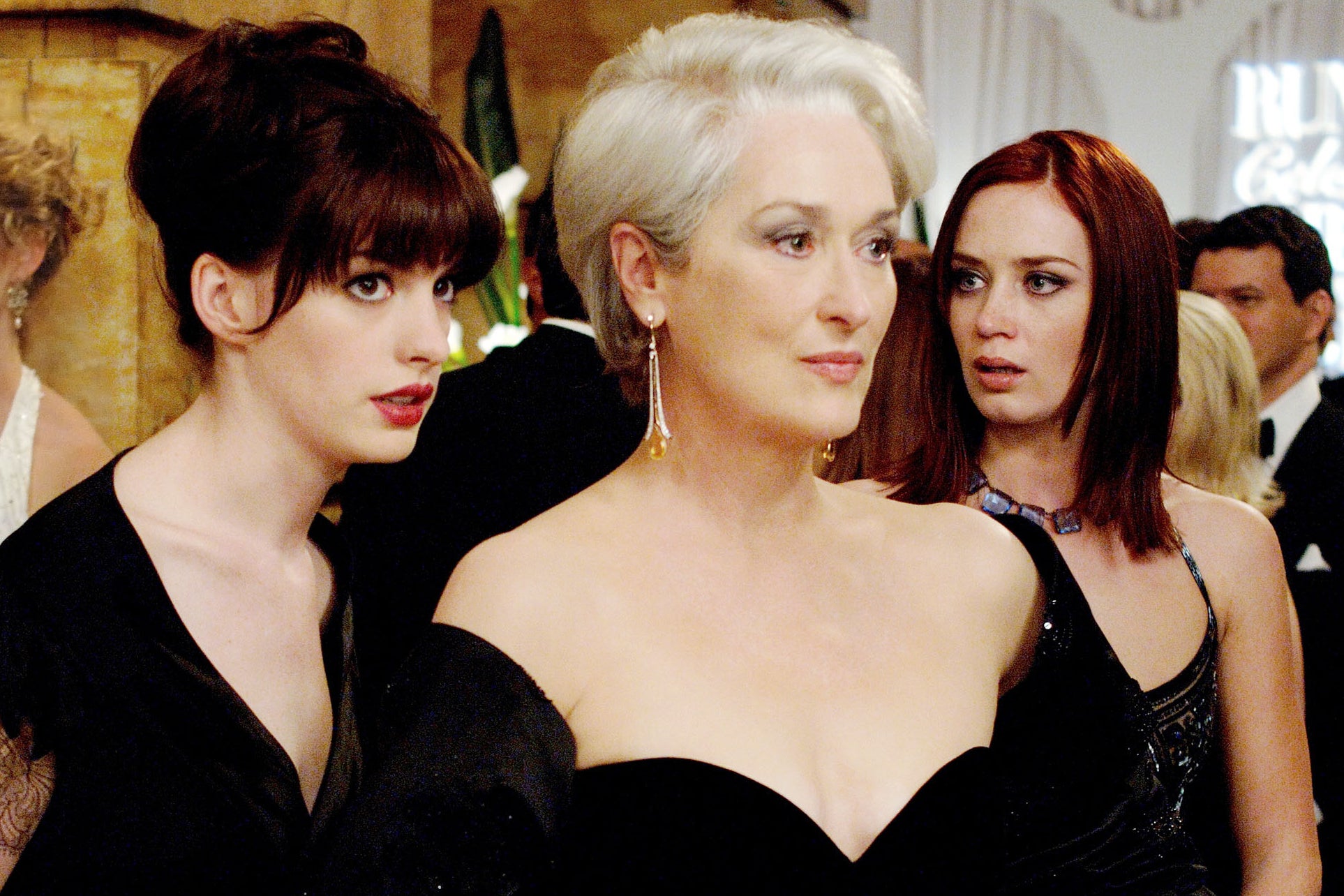 Blunt (far right) opposite Anne Hathaway and Meryl Streep in ‘The Devil Wears Prada’ (Shutterstock)