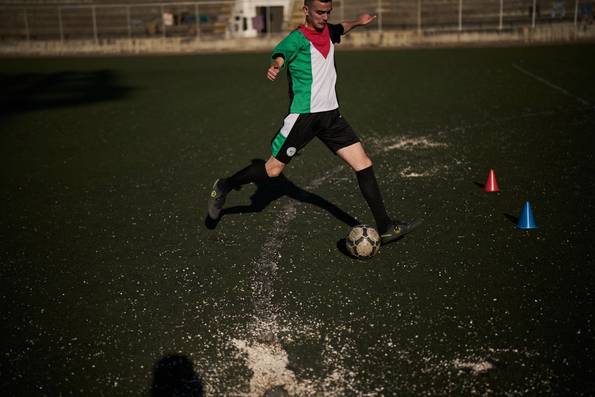 Soccer offers West Bank Palestinians an escape as the World 