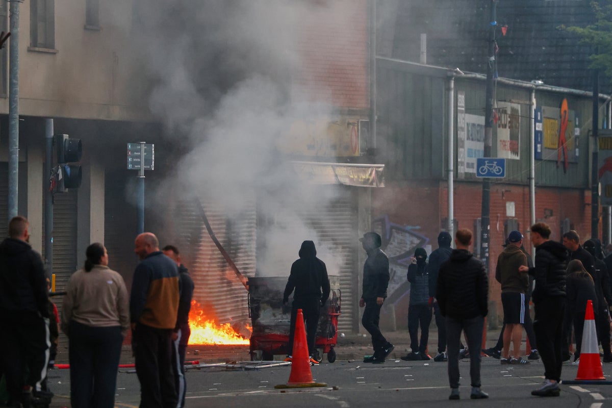 Family of Belfast stabbing victim call for racist riots to s