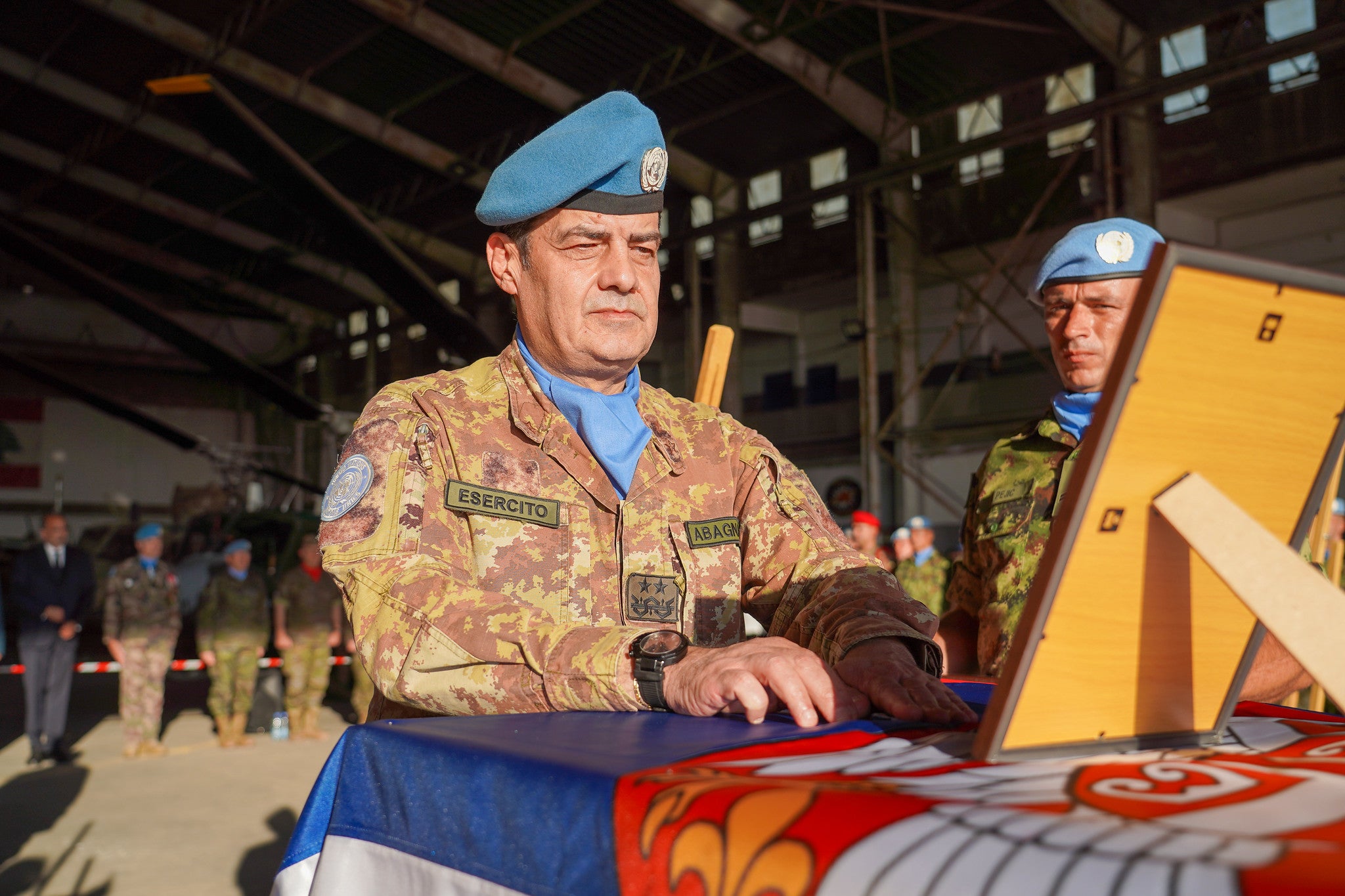 UNIFIL Head of Mission and Force Commander Major General Diodato Abagnara leads a memorial ceremony for Serbian Staff Sergeant Milovan, the seventh 'blue helmet' to be killed since 2 March.