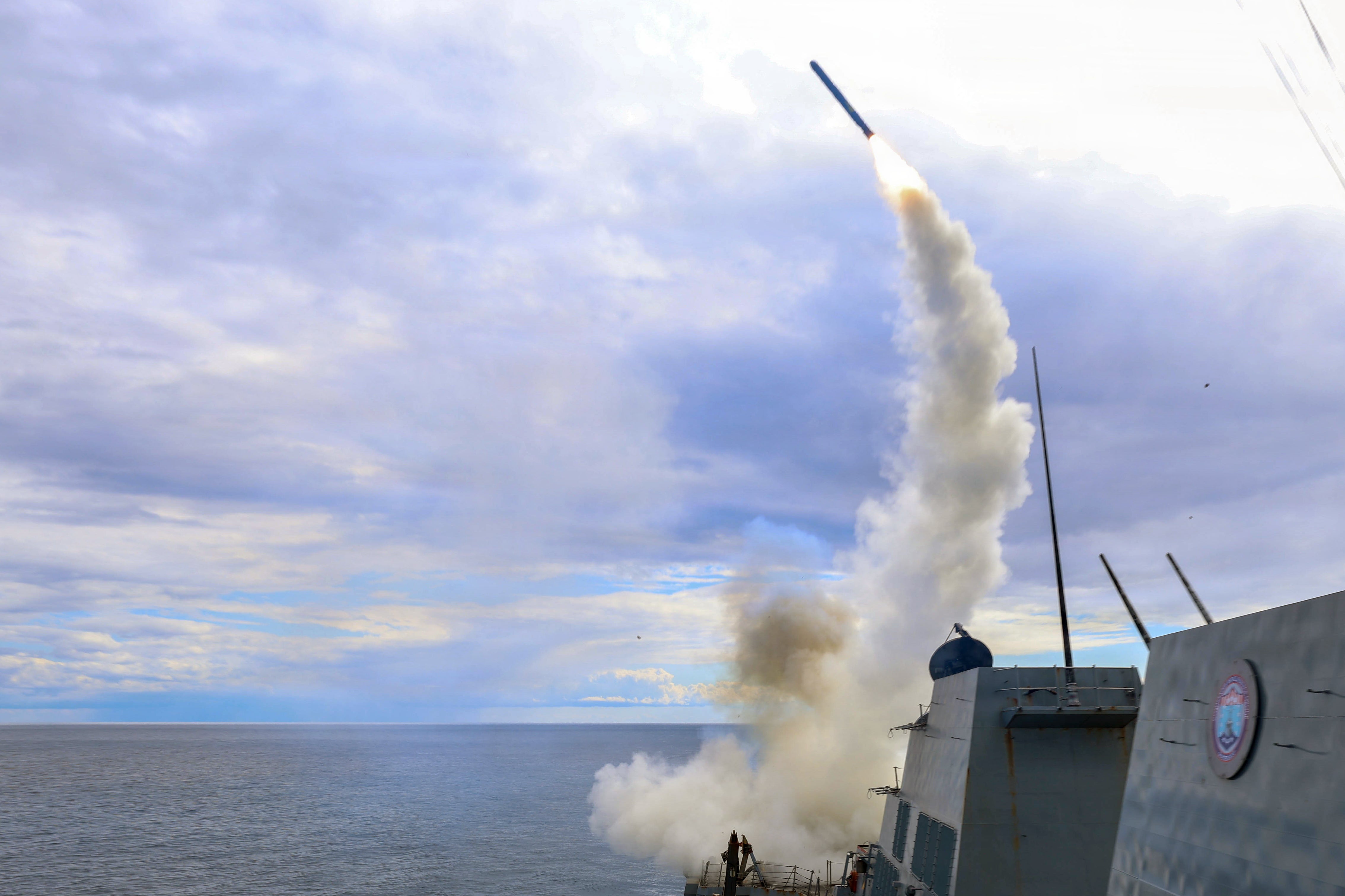 A Tomahawk land-attack missile being fired from the USS Thomas Hudner in support of Operation Epic Fury