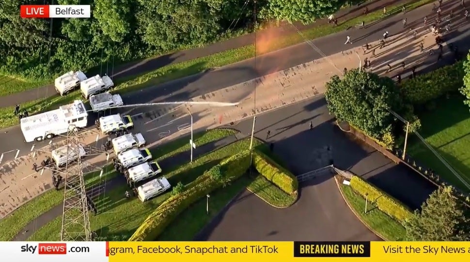 Water cannon is sprayed at protesters