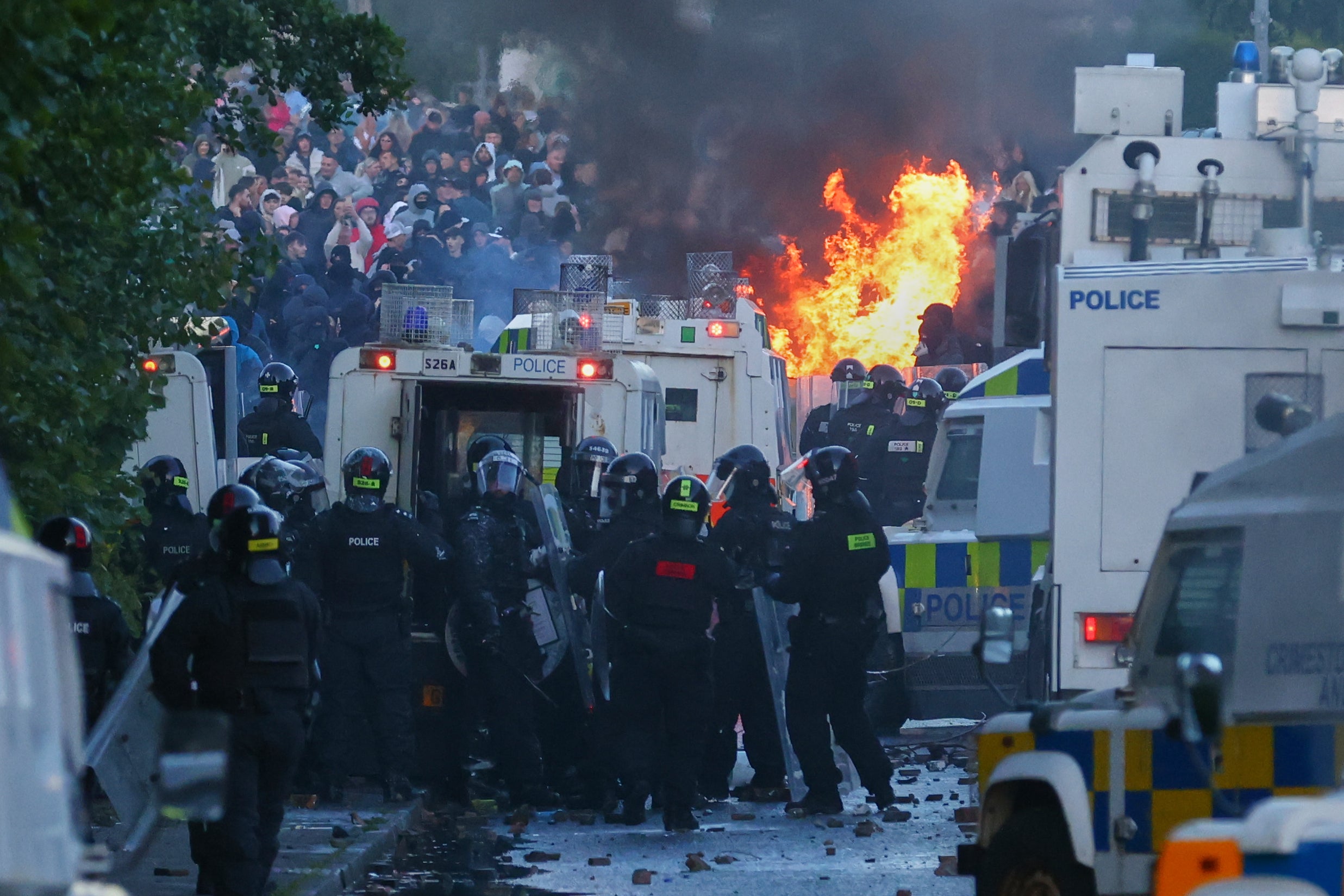 Police attempt to clear protesters near Newtownabbey, northwest Belfast, Northern Ireland, on Wednesday night