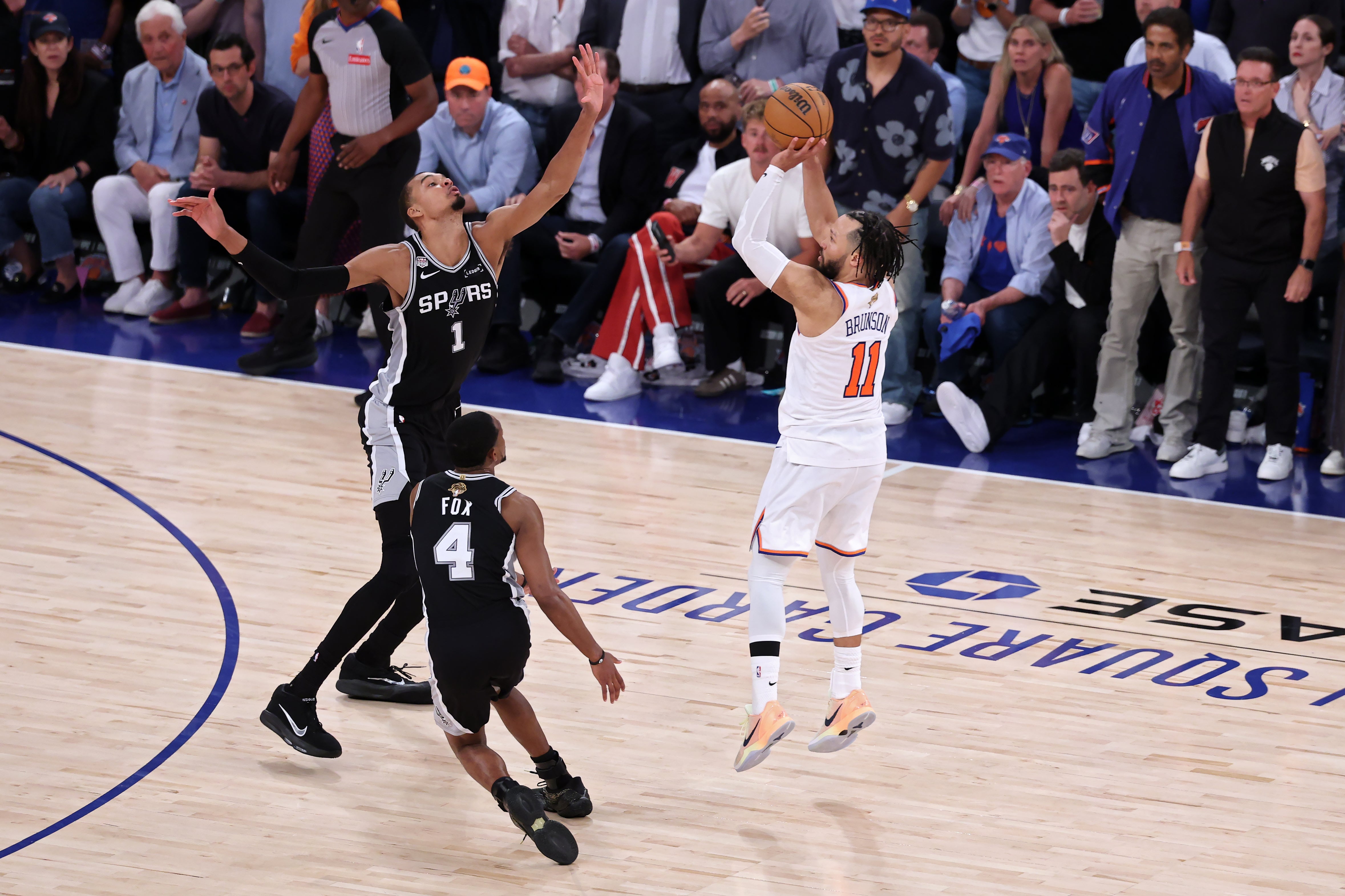 Jalen Brunson of the New York Knicks shoots the ball against Victor Wembanyama
