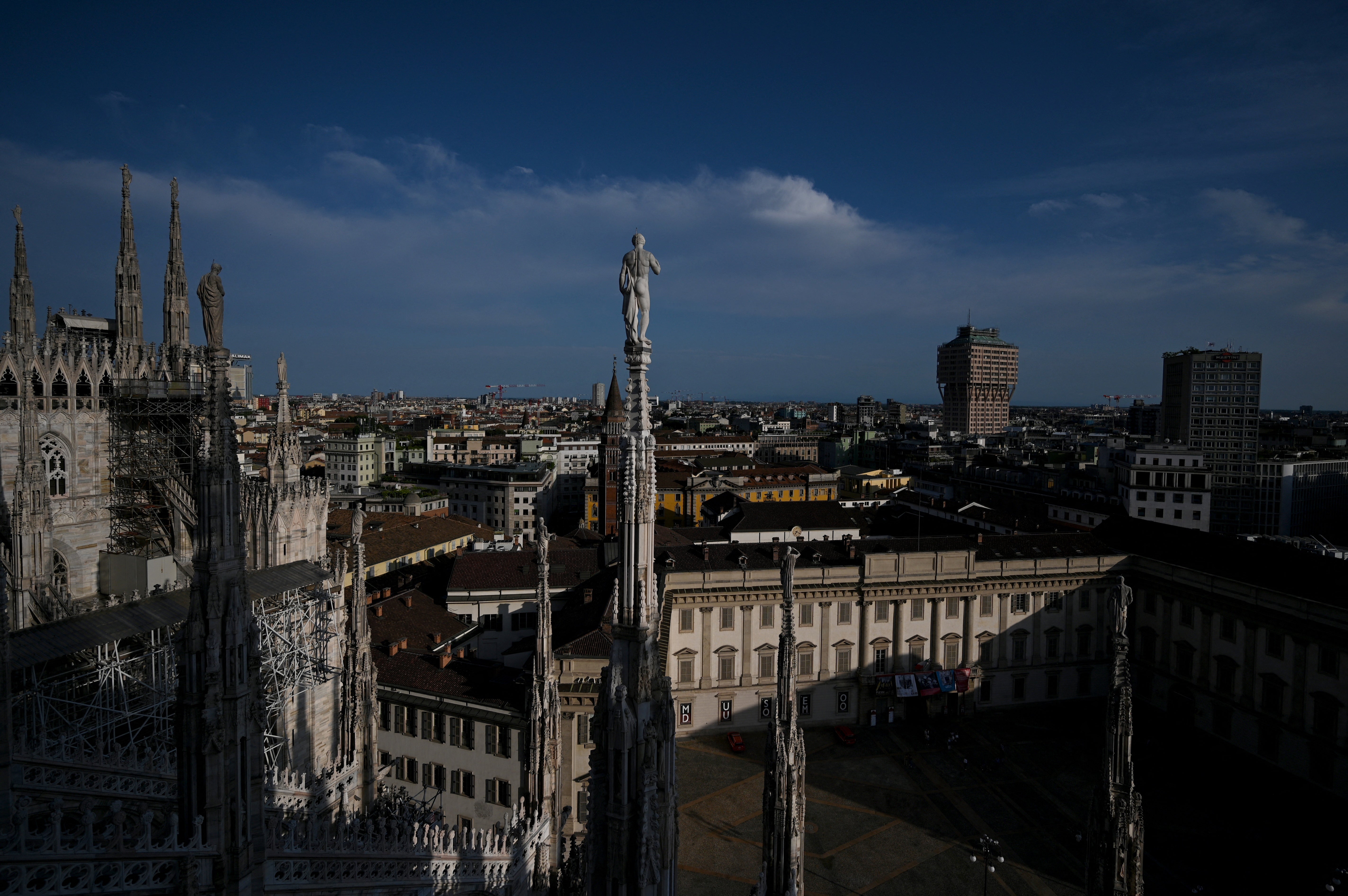 Milan's skyline is seen from the terrace of Duomo Cathedral in Milan