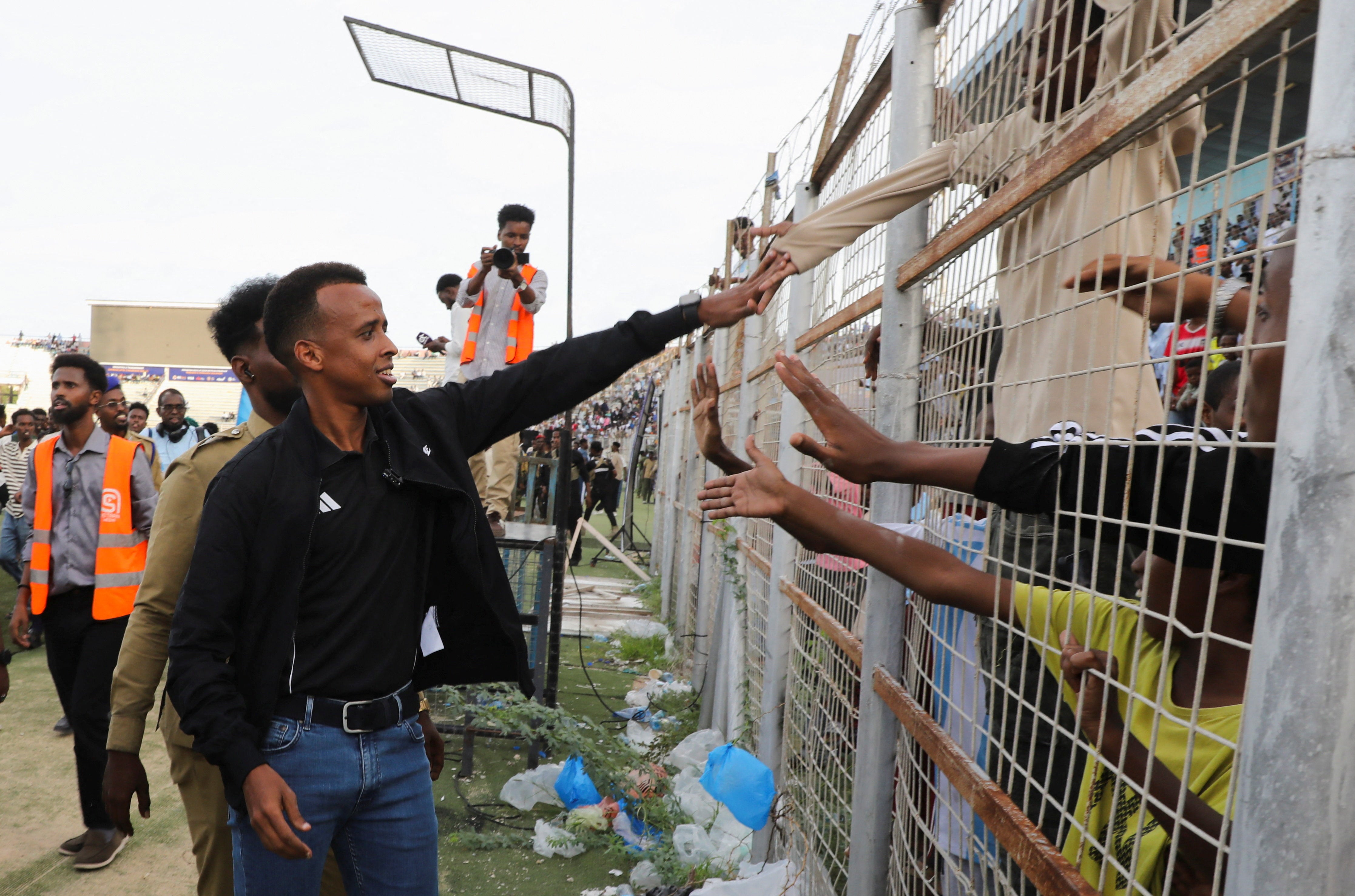 Fans welcome Somali referee Artan in Mogadishu.