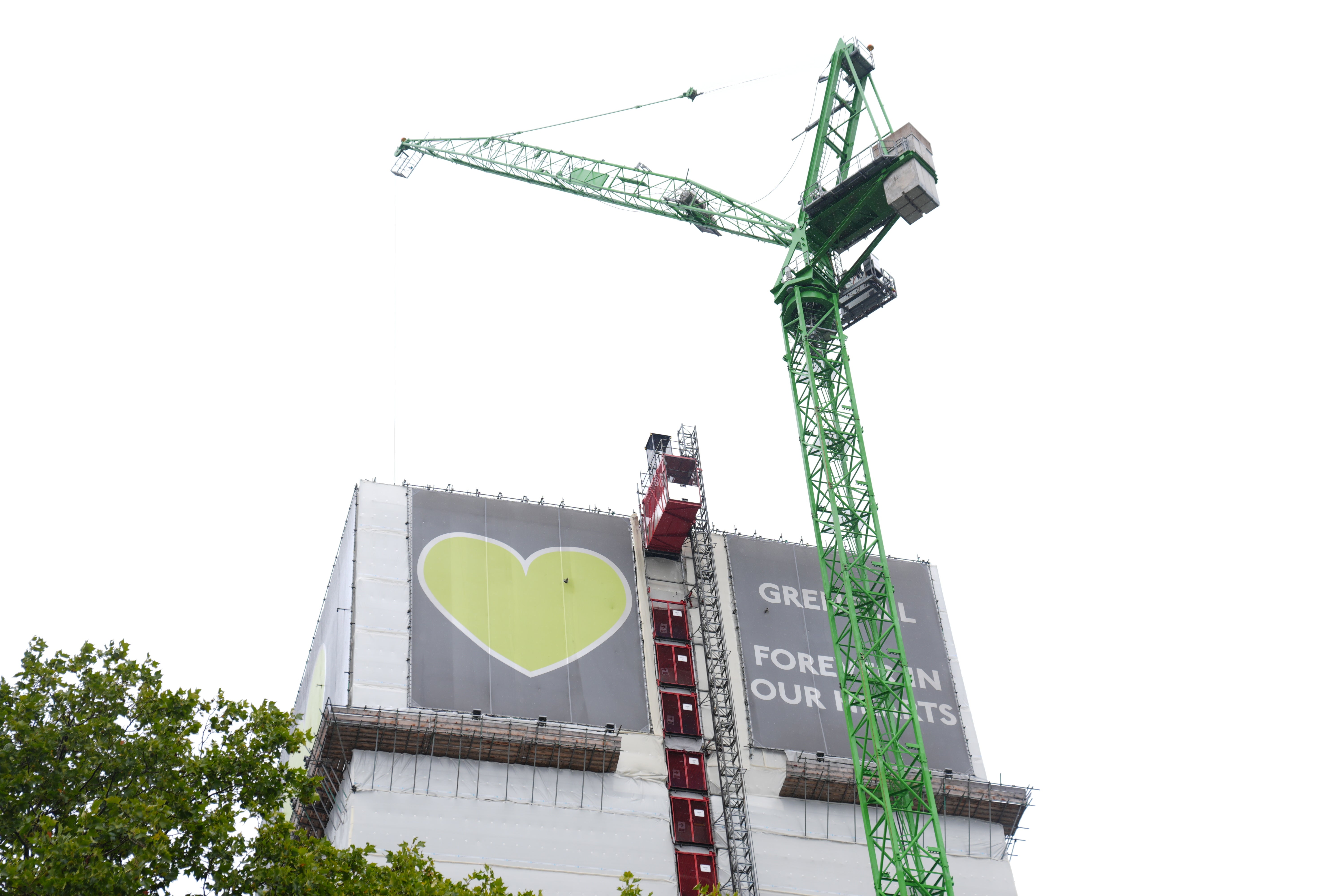 A crane over the Grenfell Tower where demolition work is underway