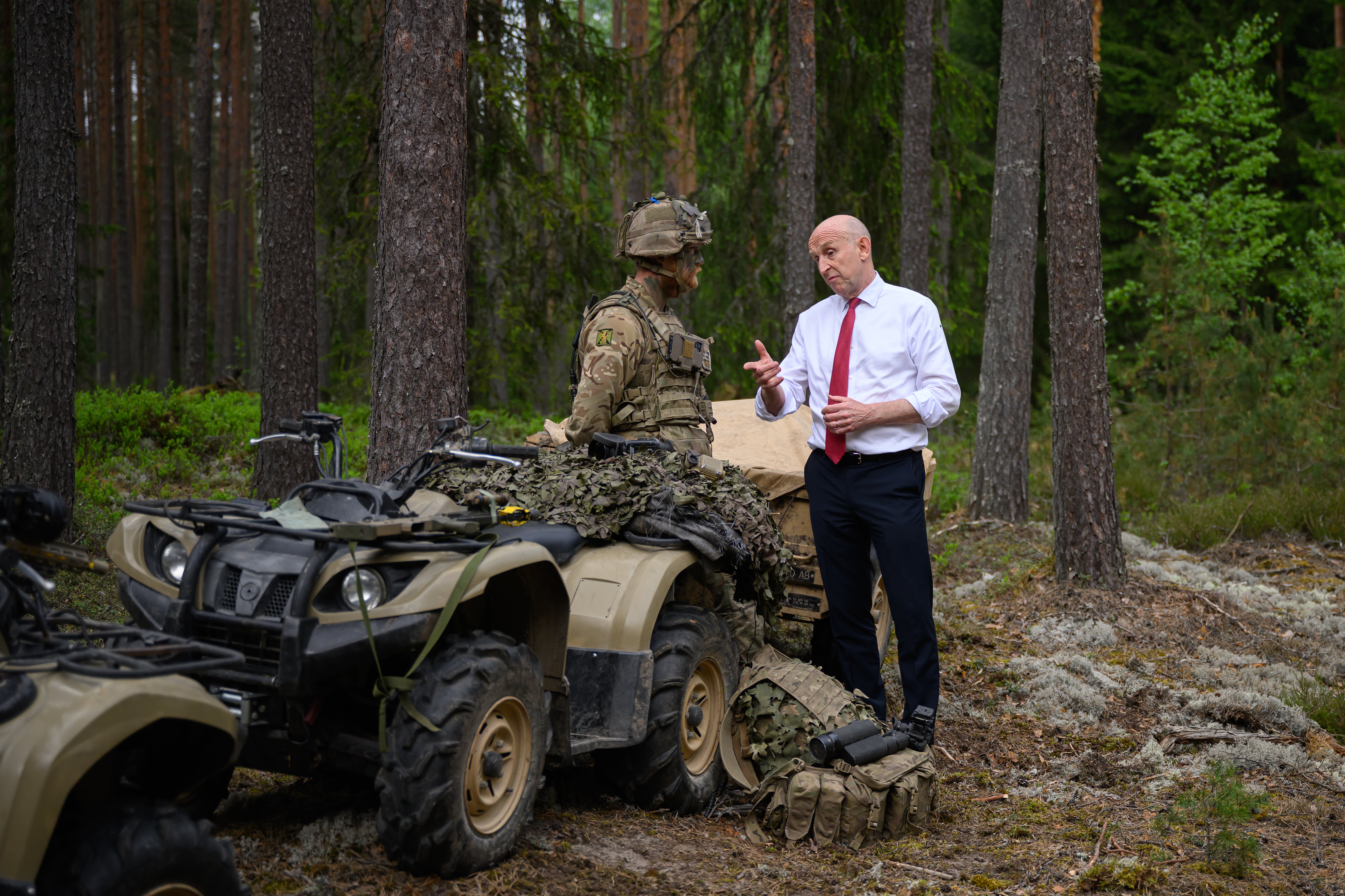 John Healey speaks with a member of 2 SCOTS of the 4th Light Brigade as they participate in exercise Spring Storm on 21 May 2026