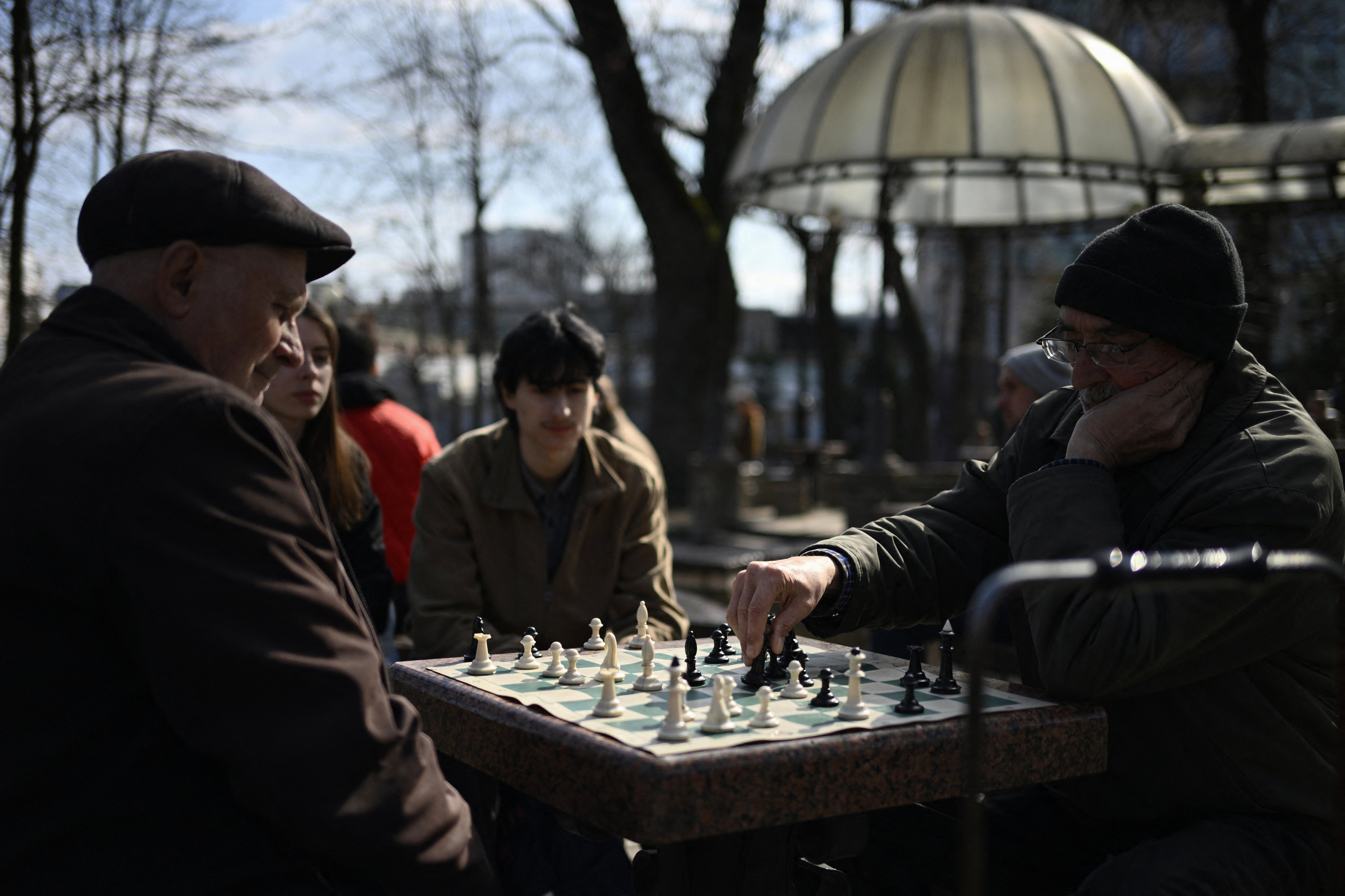 People play chess at a park in central Kyiv on March 25, 2026, amid the Russian invasion of Ukraine