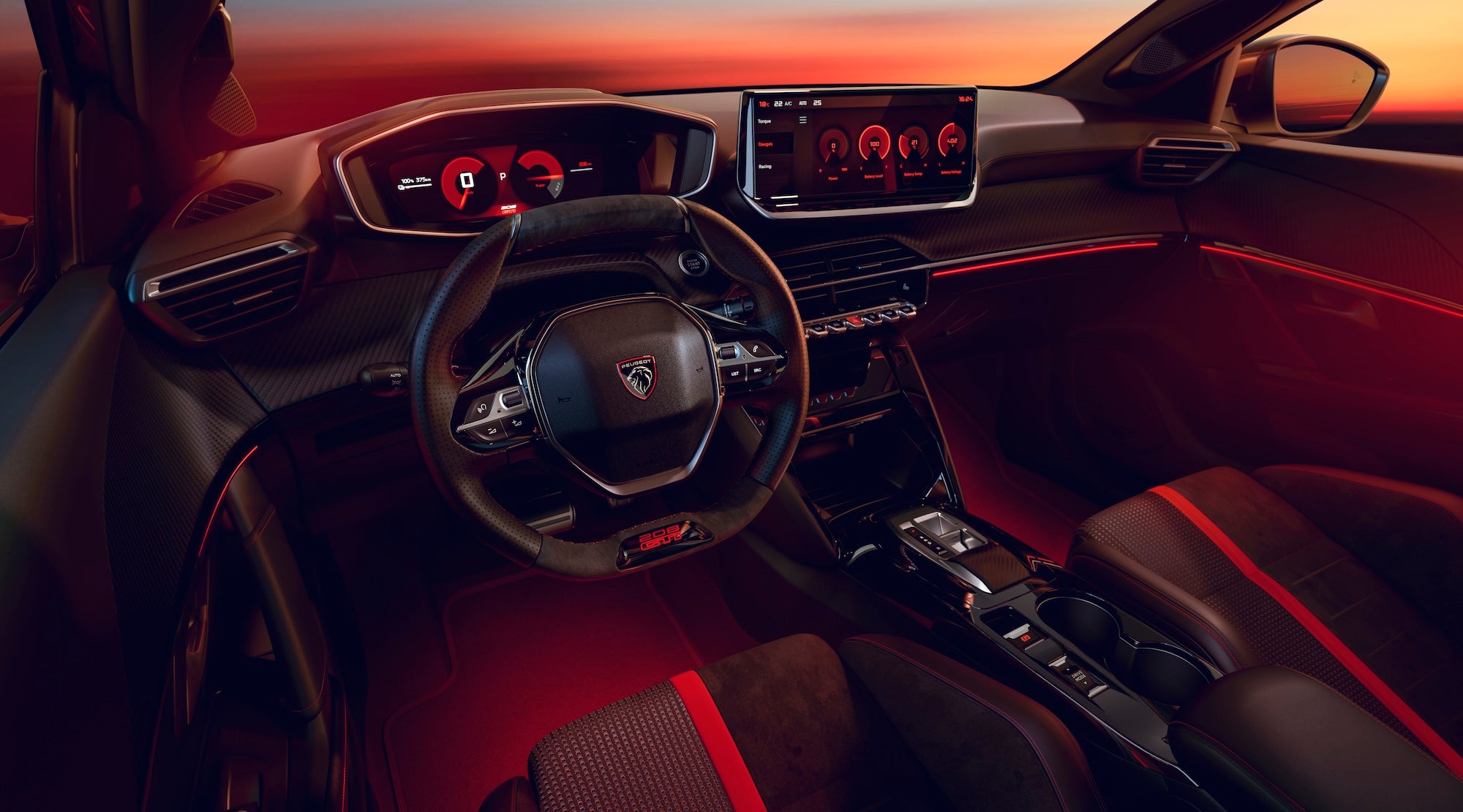 The inside of the Peugeot E-208 GTi is also inspired by the 208 GTi with loads of red detailing including red carpets!