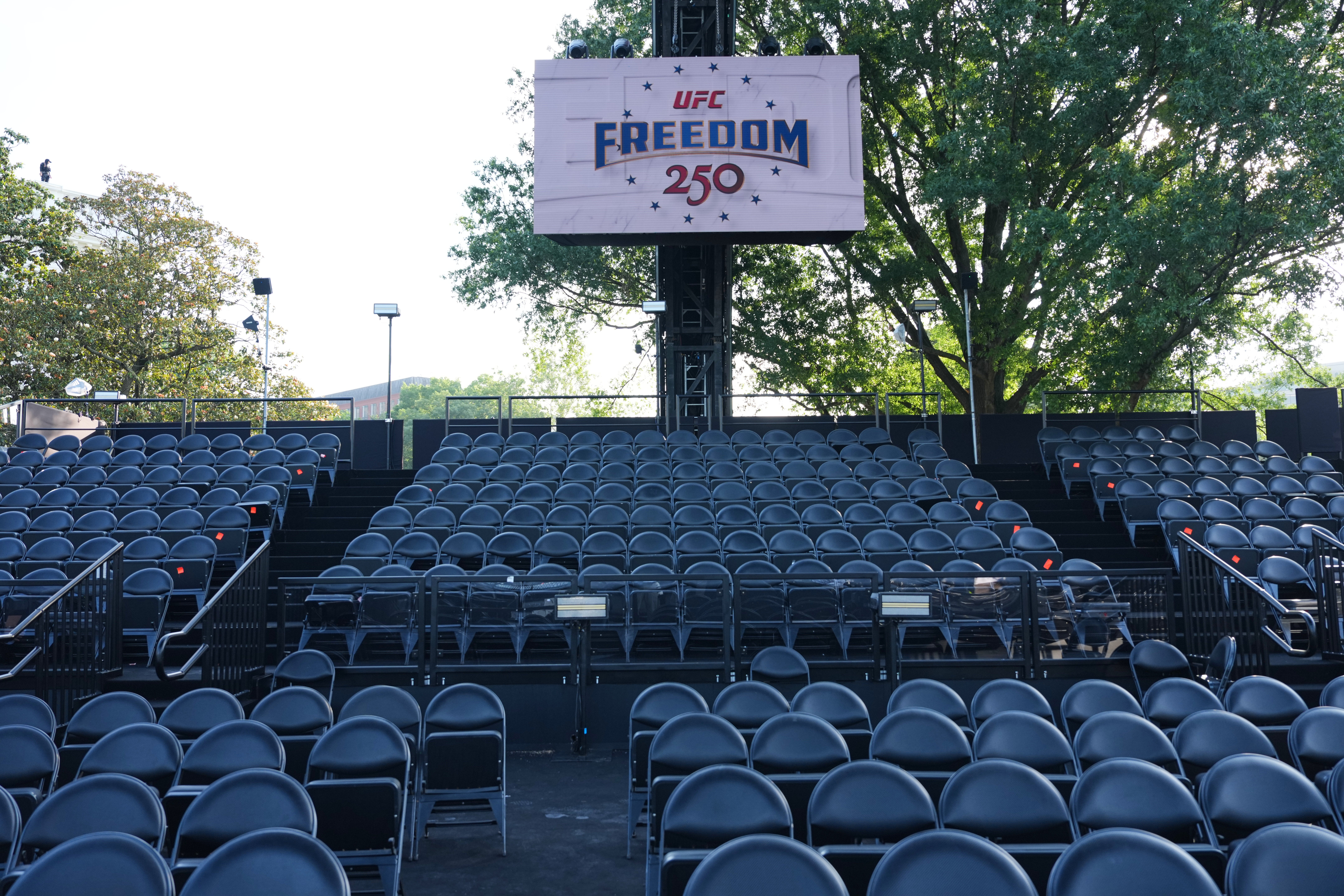 The small temporary arena has several monitors hung around to ensure everyone can see the action in the octagon