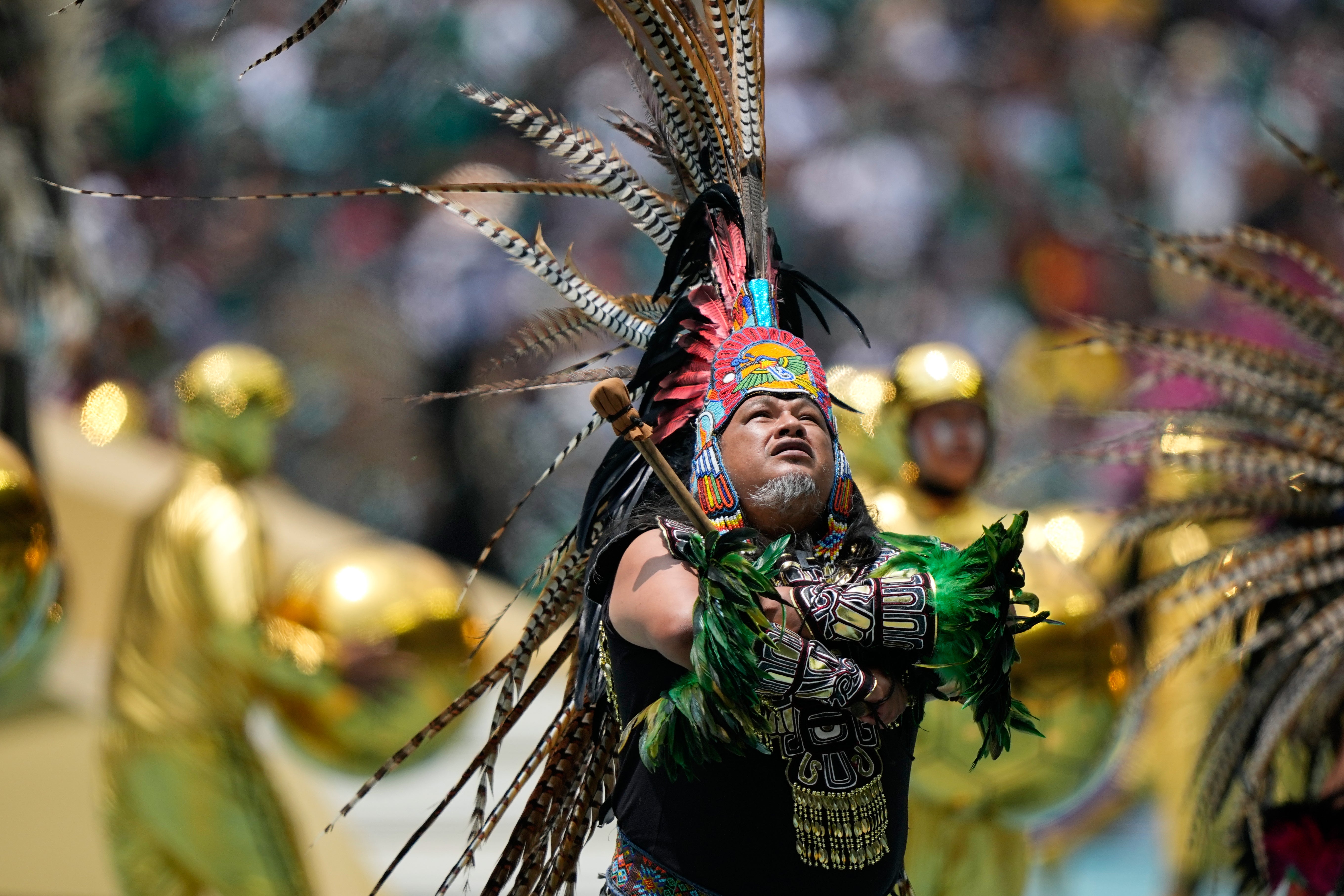 Performers on the pitch during the opening ceremony before the start of the World Cup