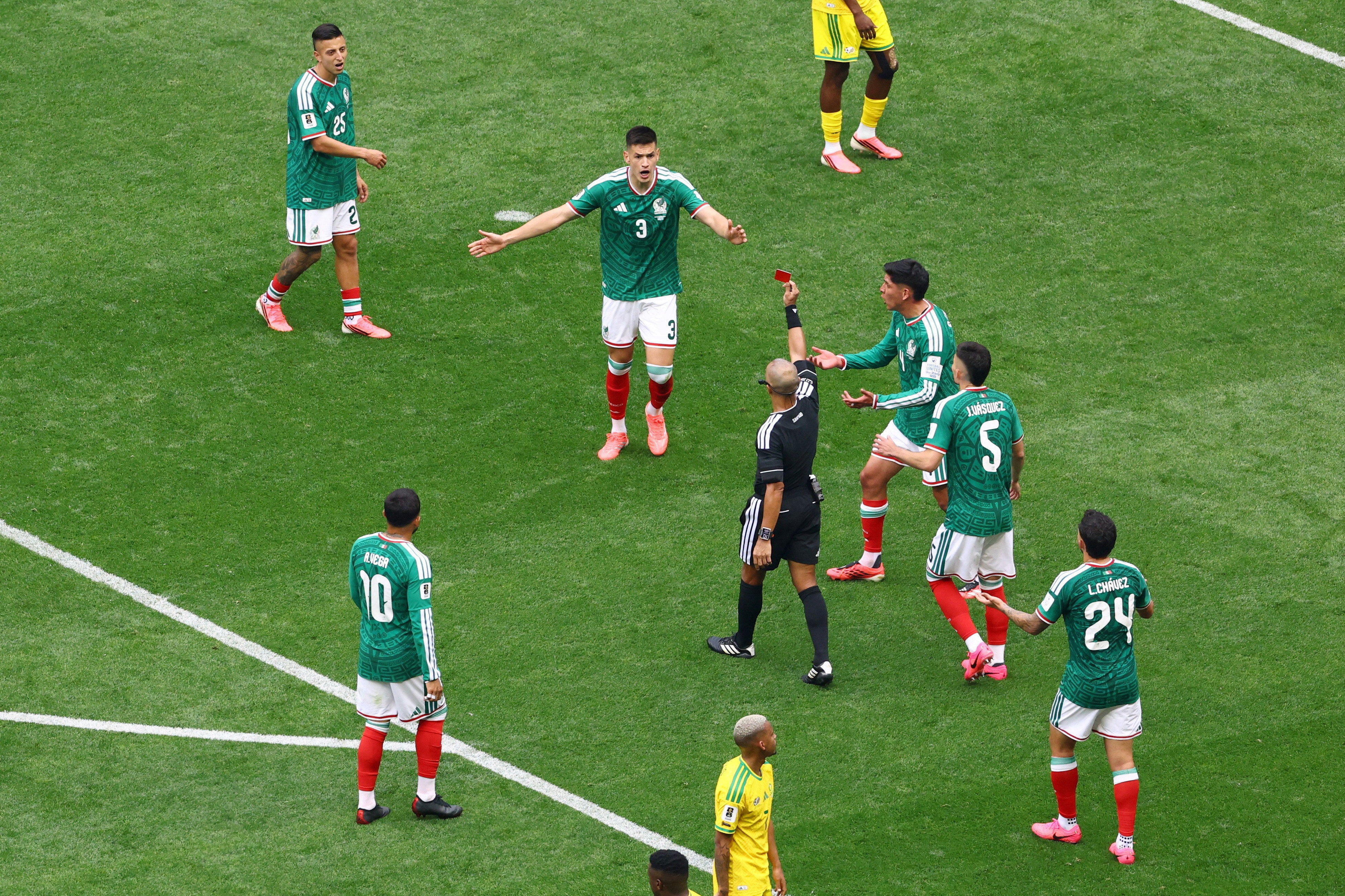 Mexico's Cesar Montes reacts after being shown a red card by referee Wilton Pereira Sampaio