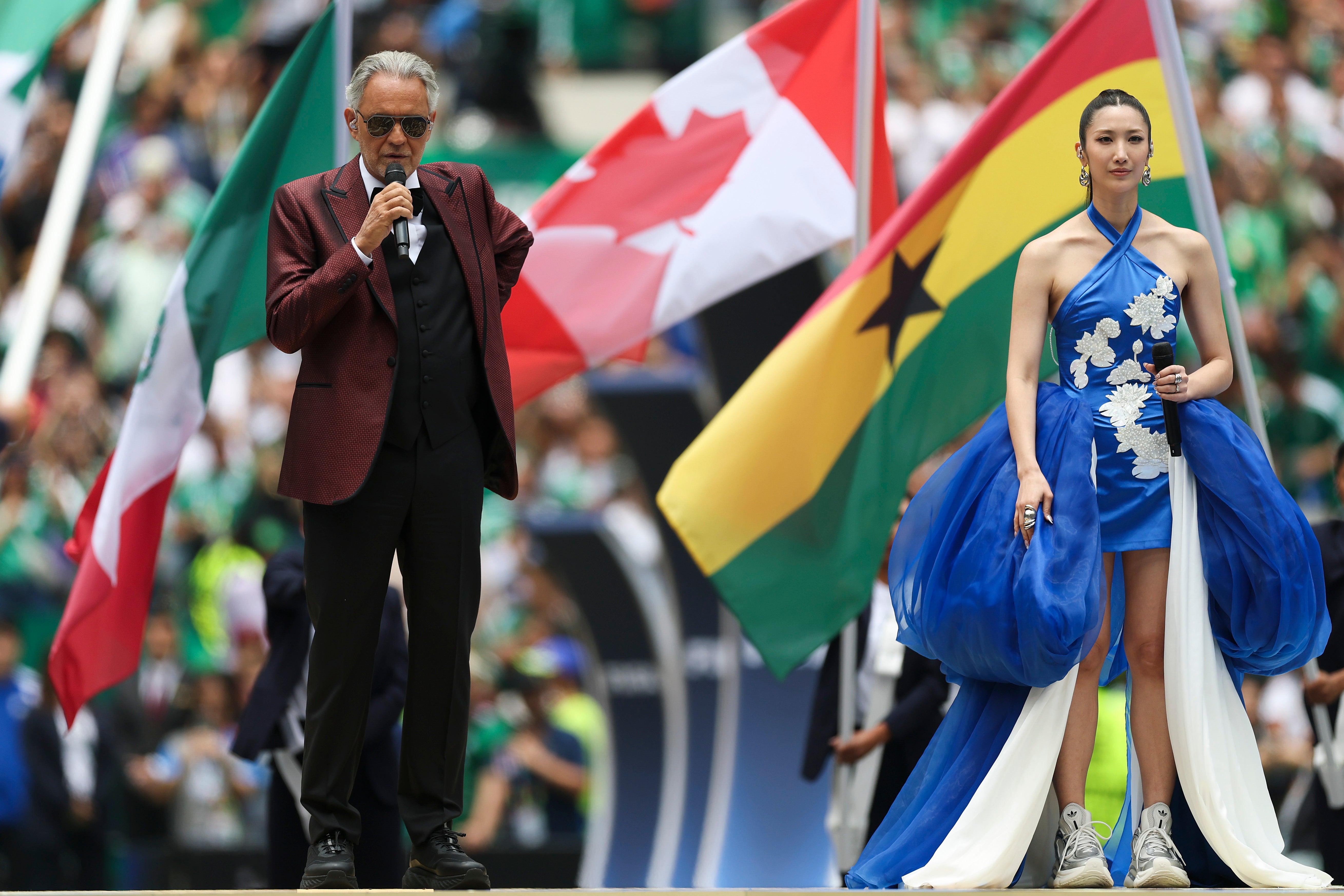 Andrea Bocelli and EJAE perform one of the tournament's official anthems. (Getty)