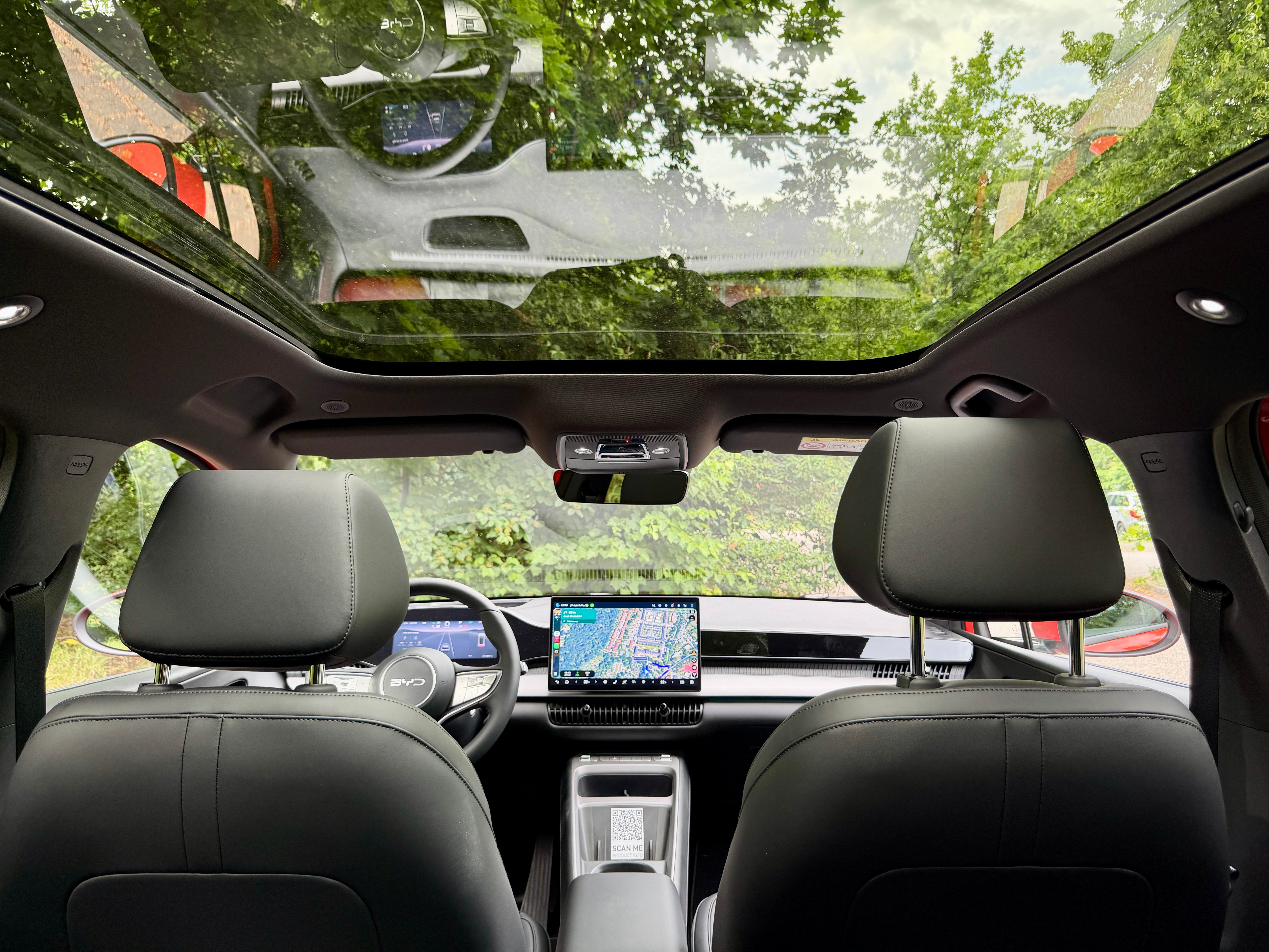 The BYD Dolphin G DM-i gets a properly premium spec with head-up display and a lovely panoramic glass roof. (Steve Fowler)