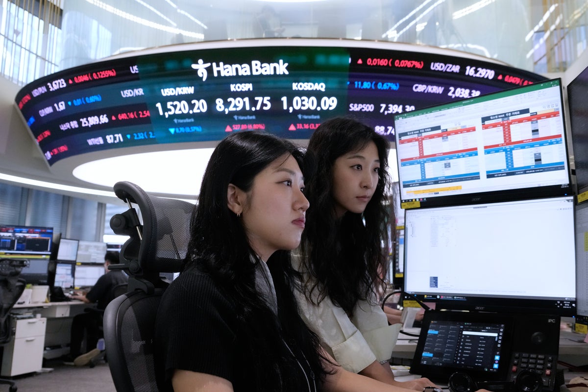Asian shares surge and oil prices slip after Trump claims a 