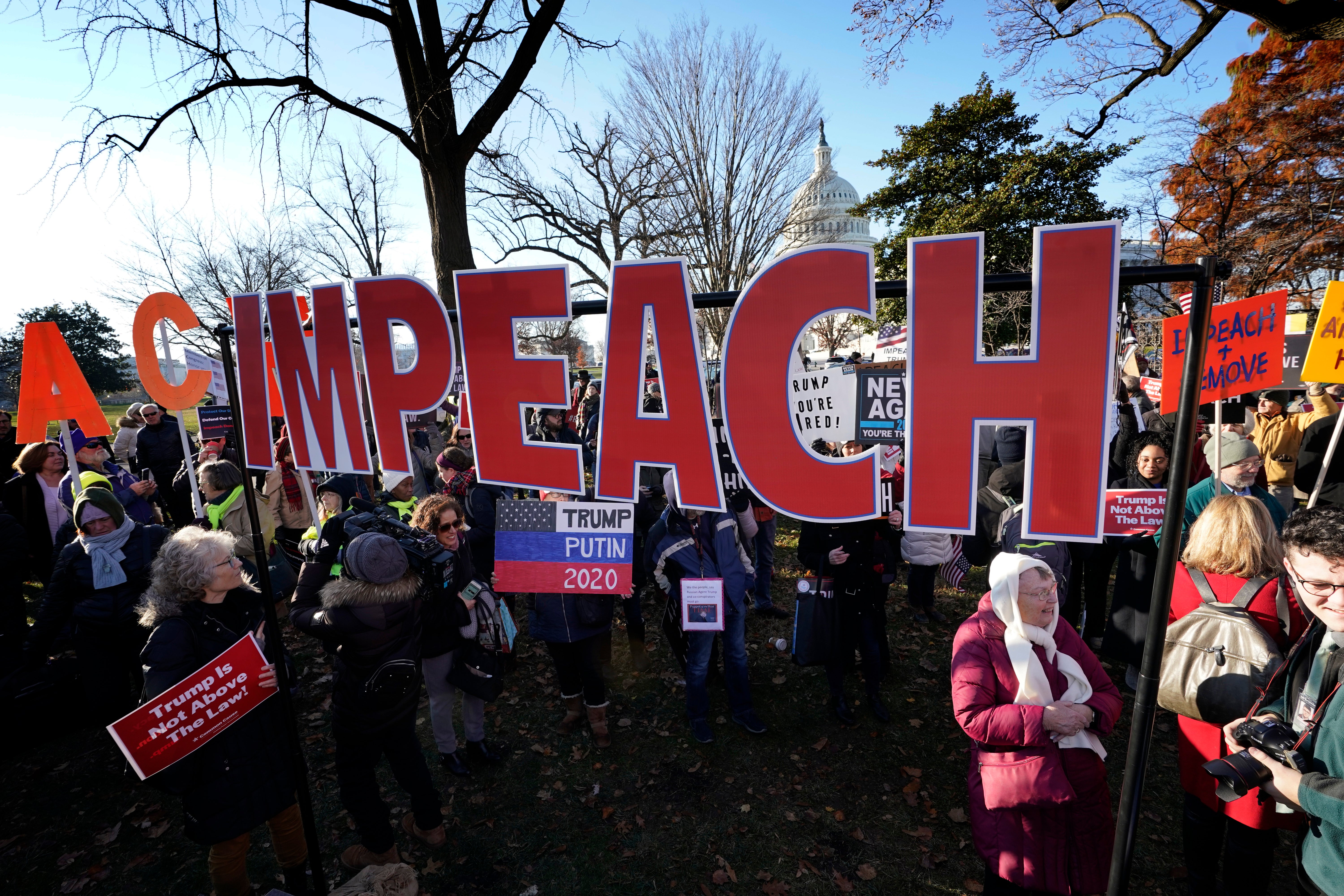 Trump was impeached twice by the Democratic-led House of Representatives, first in 2019  over allegations of abusing the power of his office by attempting to extort a political favor from Ukraine, and again in January 2021 with charges of ‘incitement of insurrection’ following the January 6, 2021 Capitol riots (Getty Images)