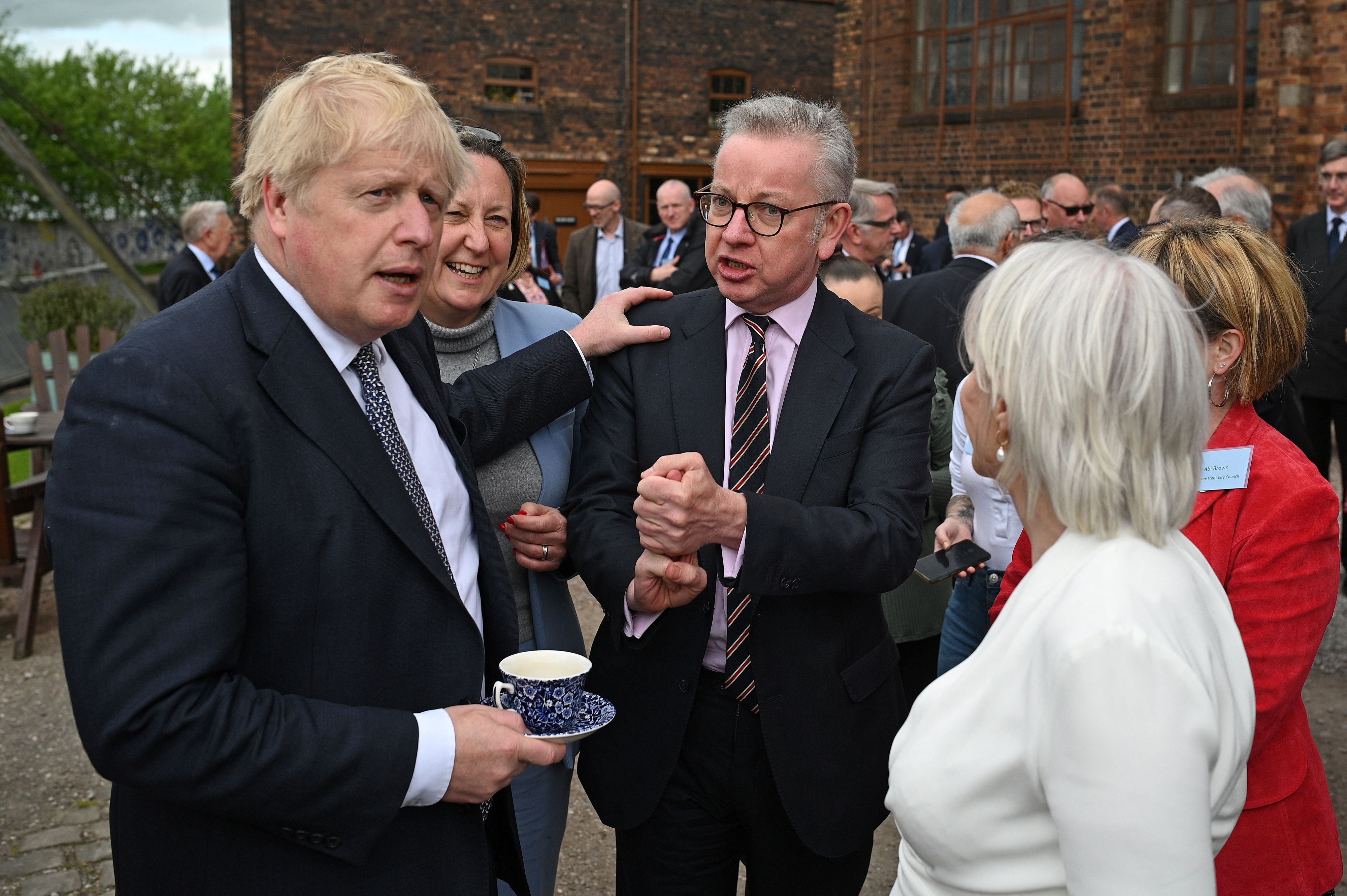 Boris Johnson with ministers after a cabinet meeting in Stoke (AFP/Getty)