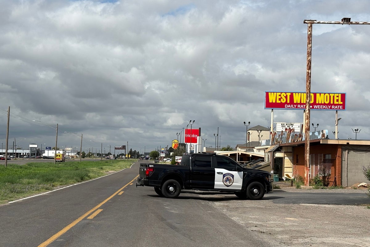 Suspect dead after standoff with police following shooting that killed one and left 10 hurt