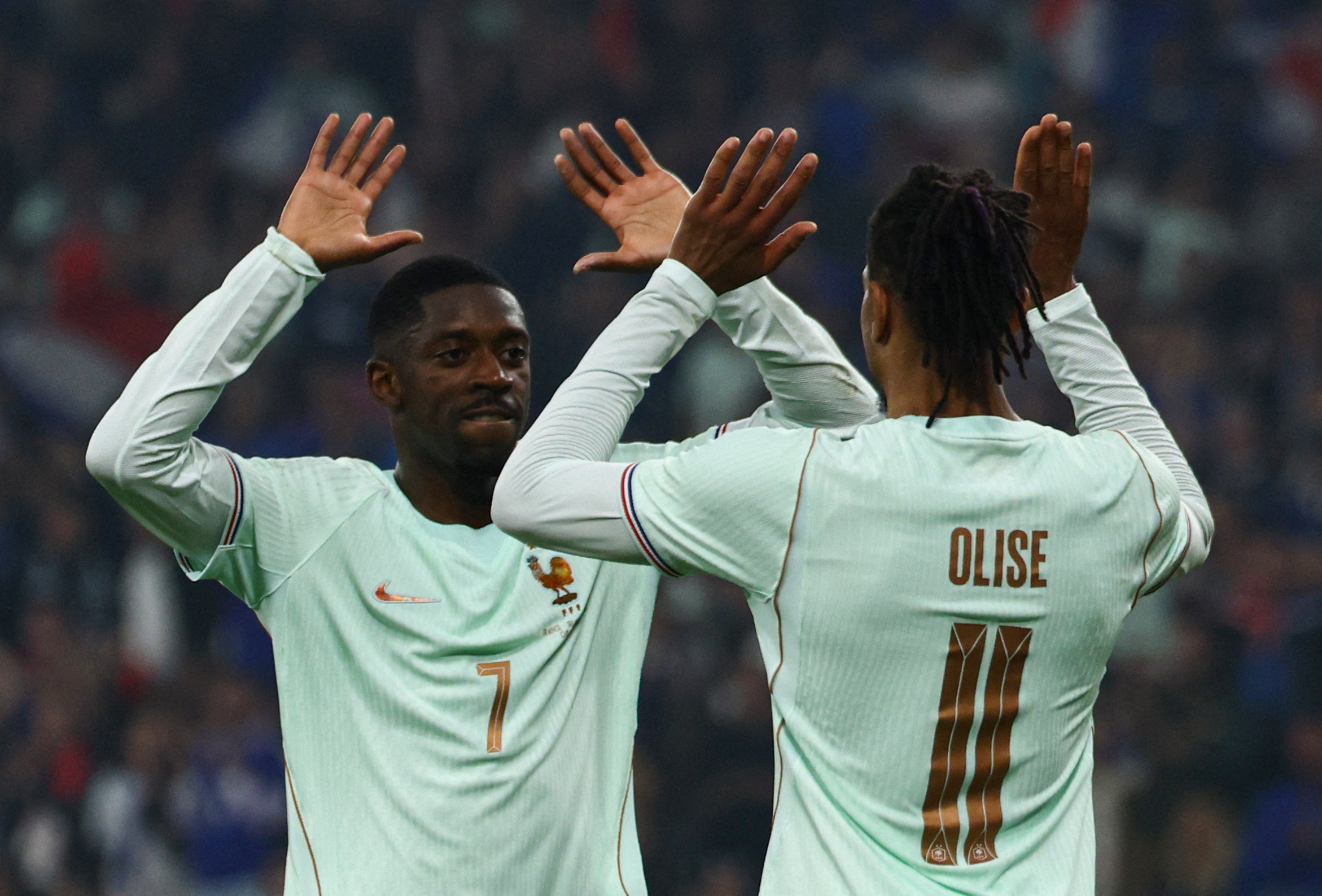 Dembele (left) says criticism of Mbappe has gone 'too far'