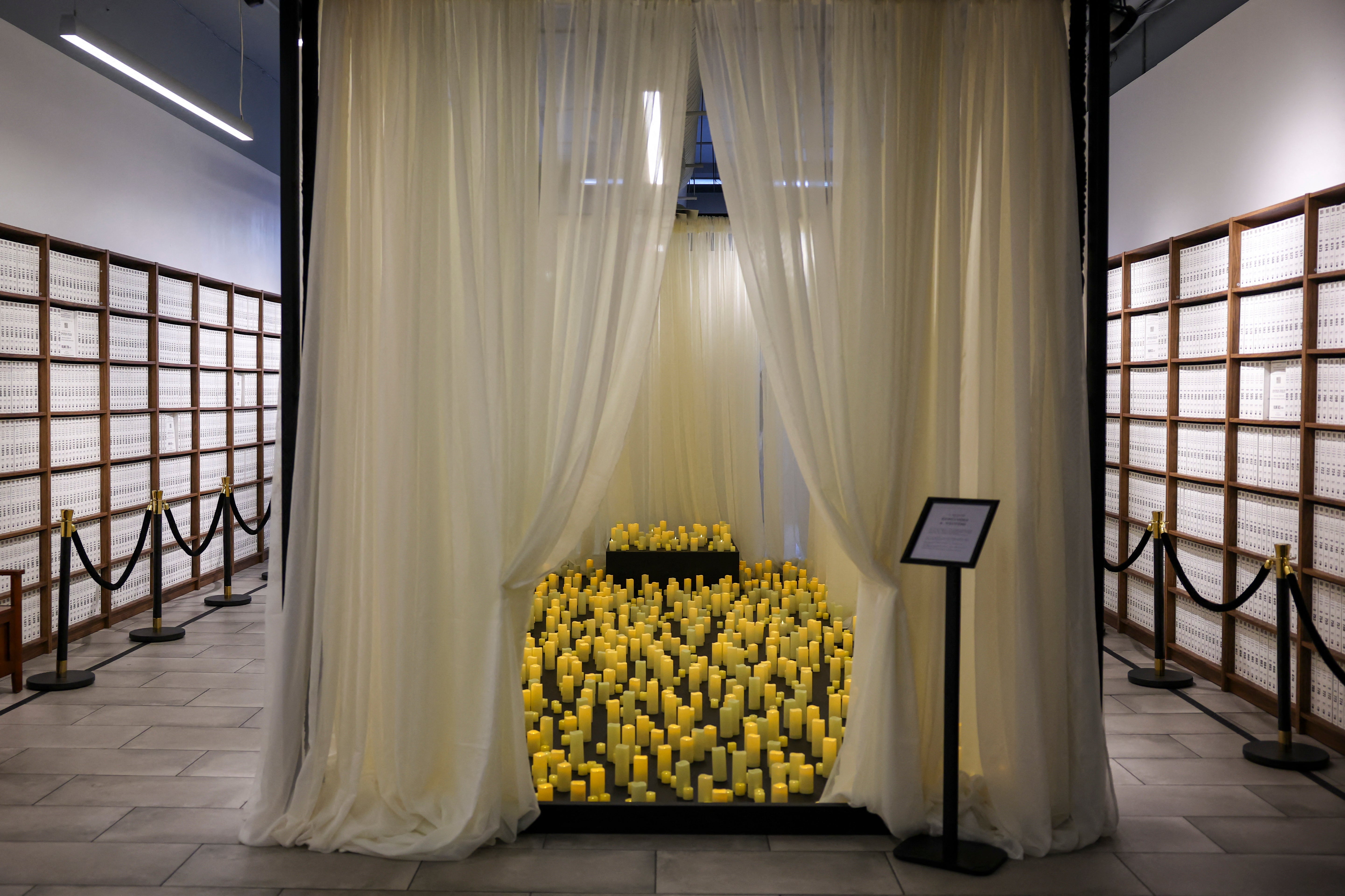 The roadshow also features 1,400 candles on display to symbolize all of the late pedophile’s victims (AFP/Getty)