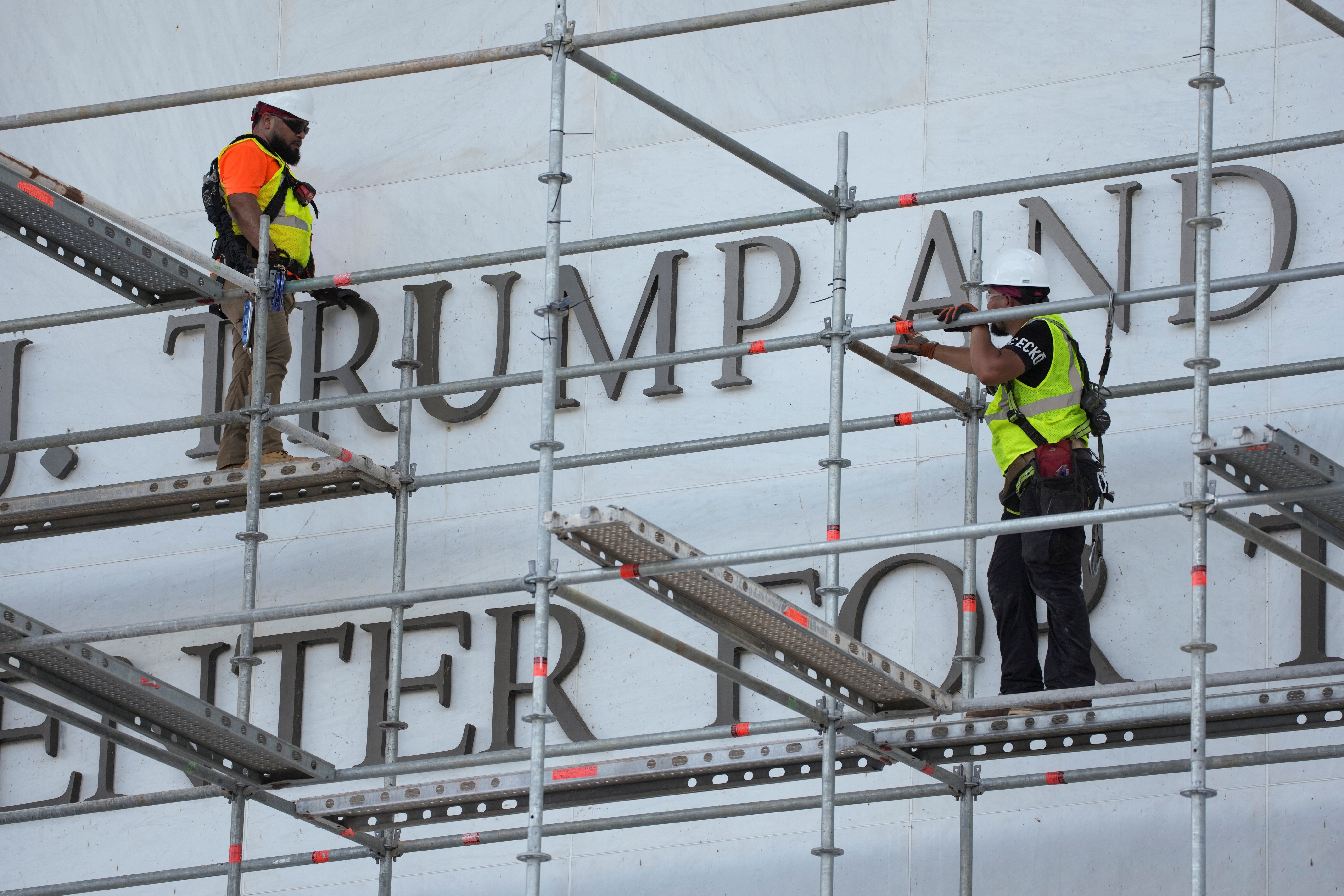 Construction workers erected scaffolding outside the Kennedy Center on June 12 to begin removing Donald Trump’s name after the administration lost another legal fight over his attempts to rename the performing arts venue after himself