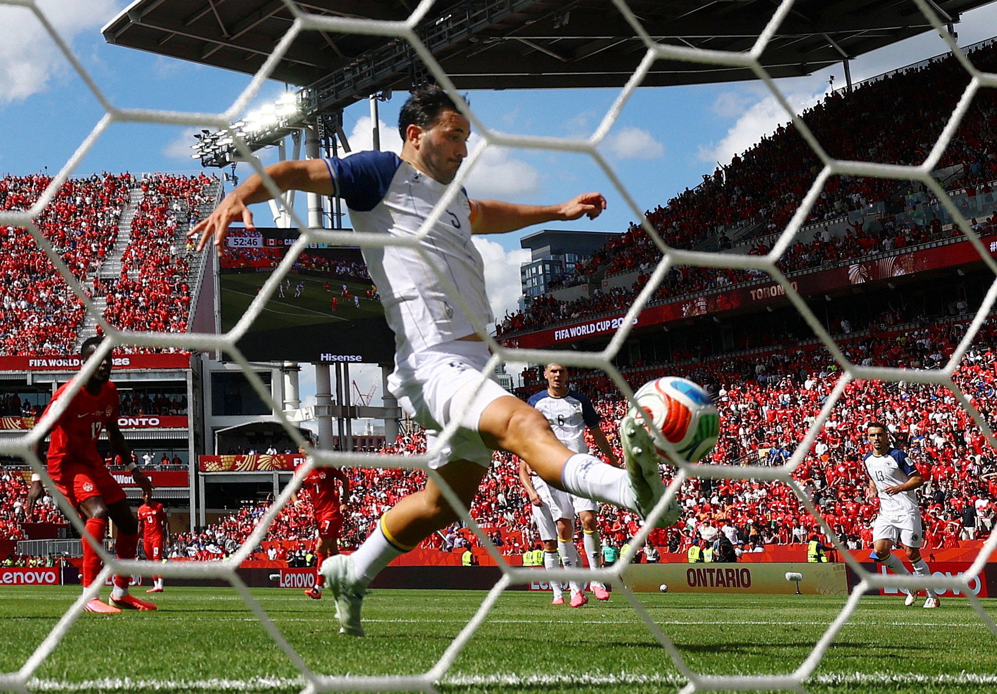 Bosnia and Herzegovina's Sead Kolasinac deflects the ball onto the crossbar after a shot (Reuters)