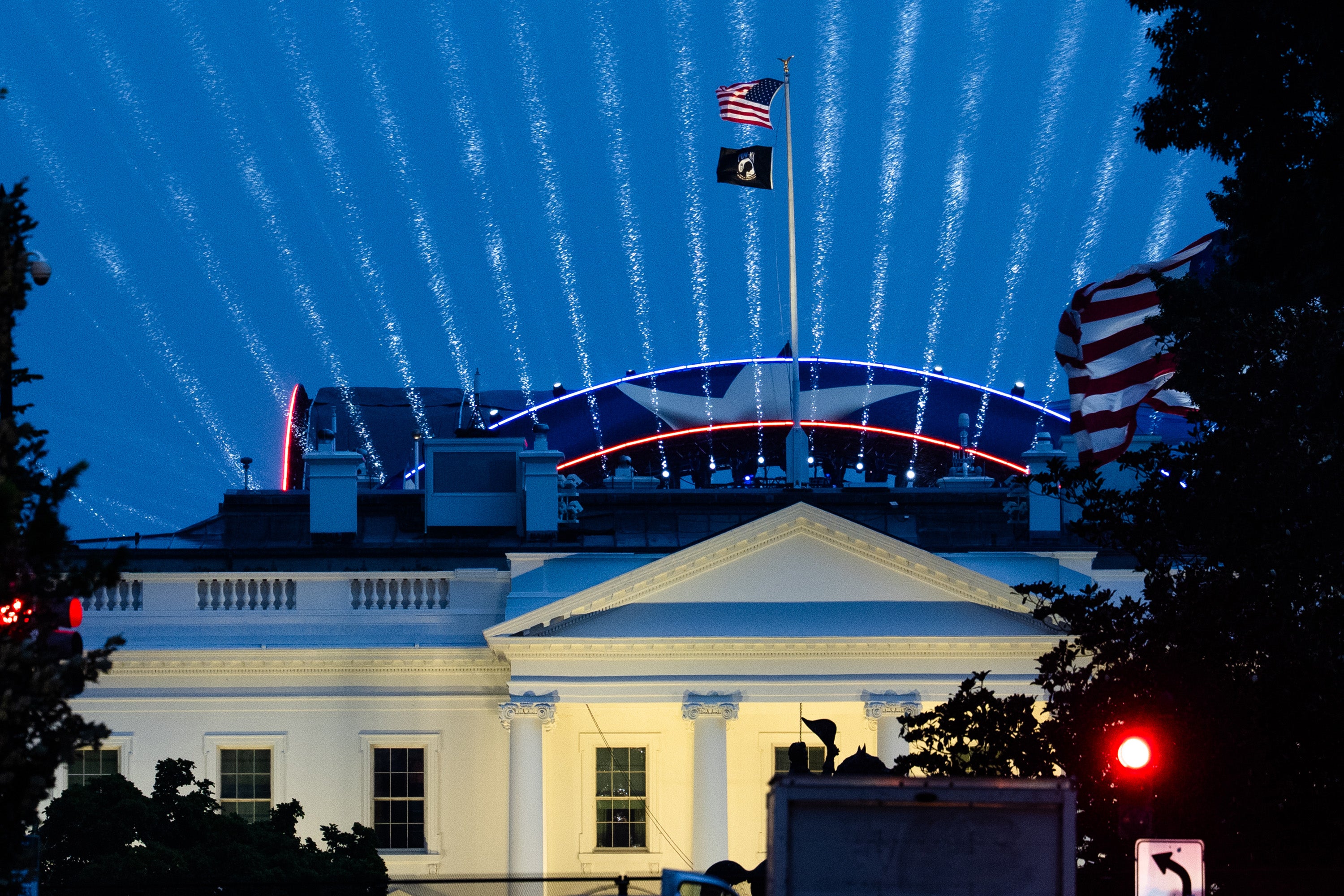 Lights shine from the outdoor UFC arena behind the White House