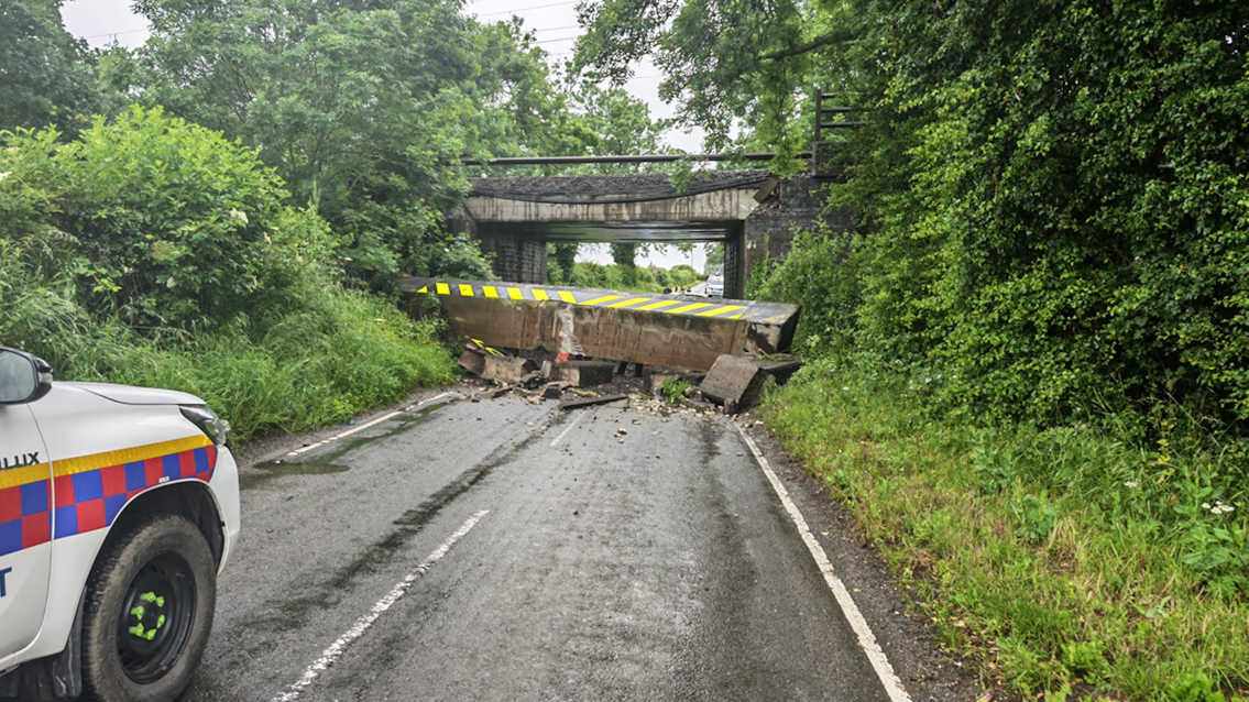 Railway bridge collapses after lorry crash causing major travel disruption