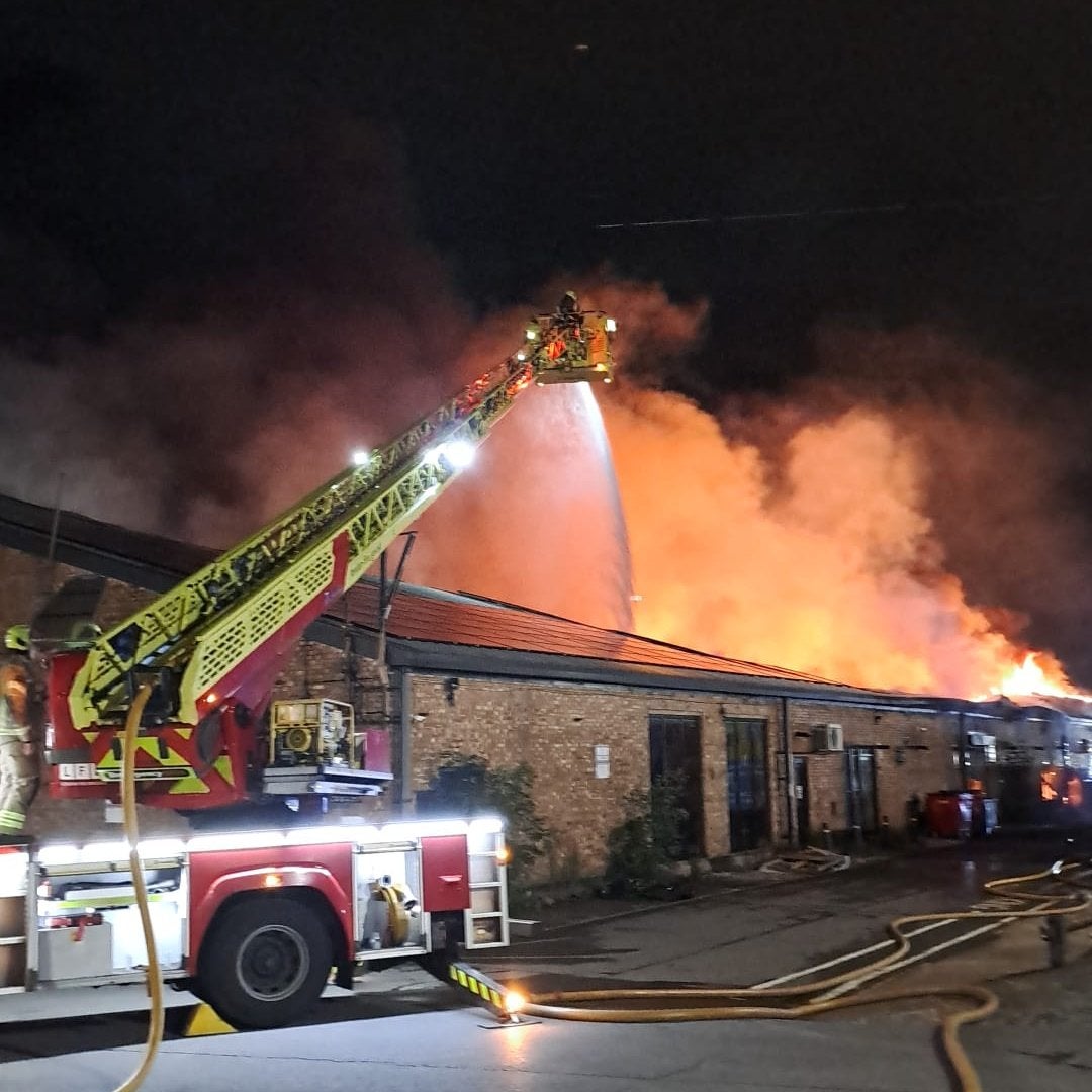Firefighters were using four spiral staircases and a high-volume pump to fight the fire.