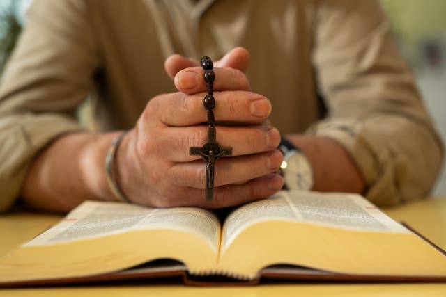 Receptionist sues for discrimination over reading Bible at work