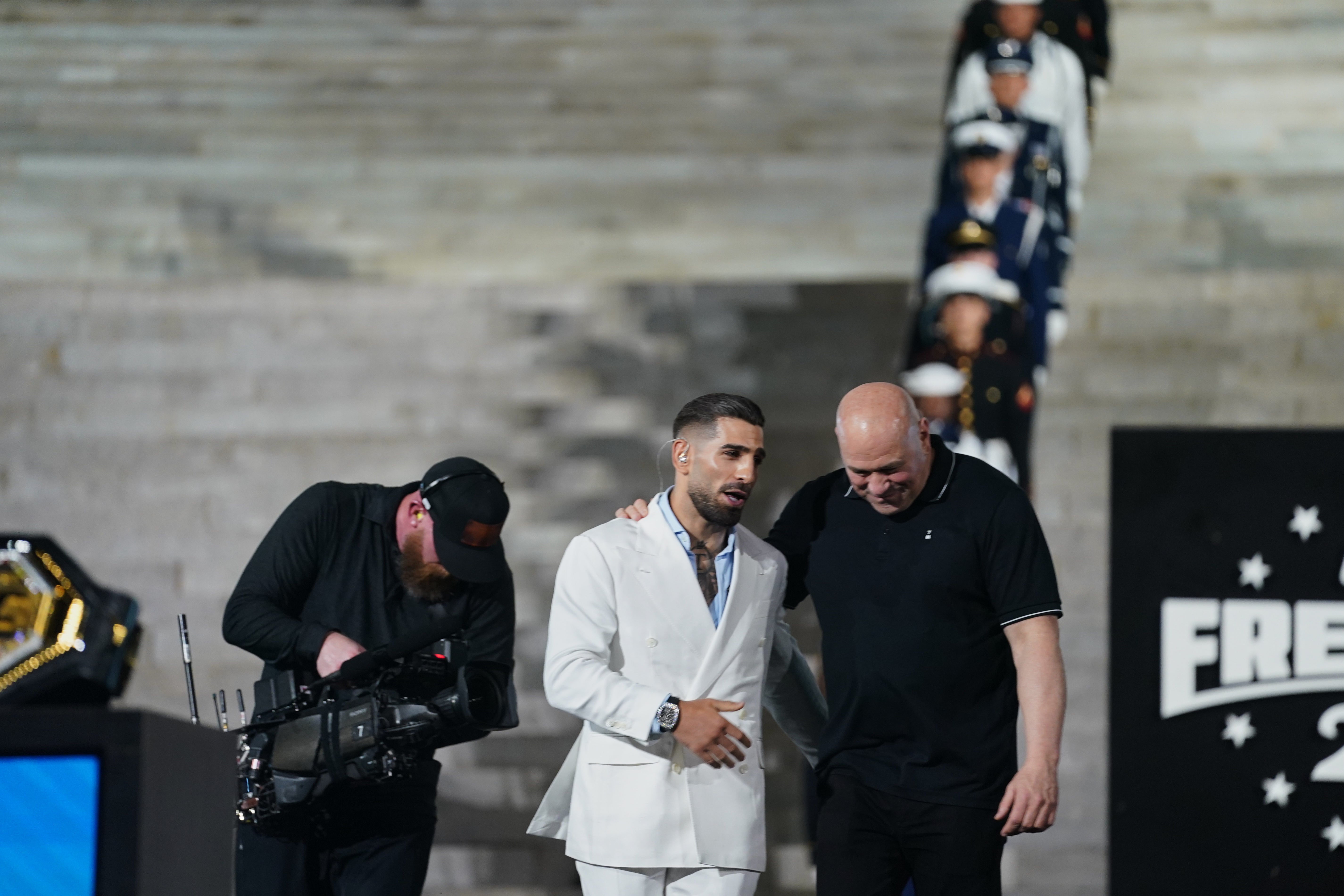 Topuria with UFC president Dana White (AP)